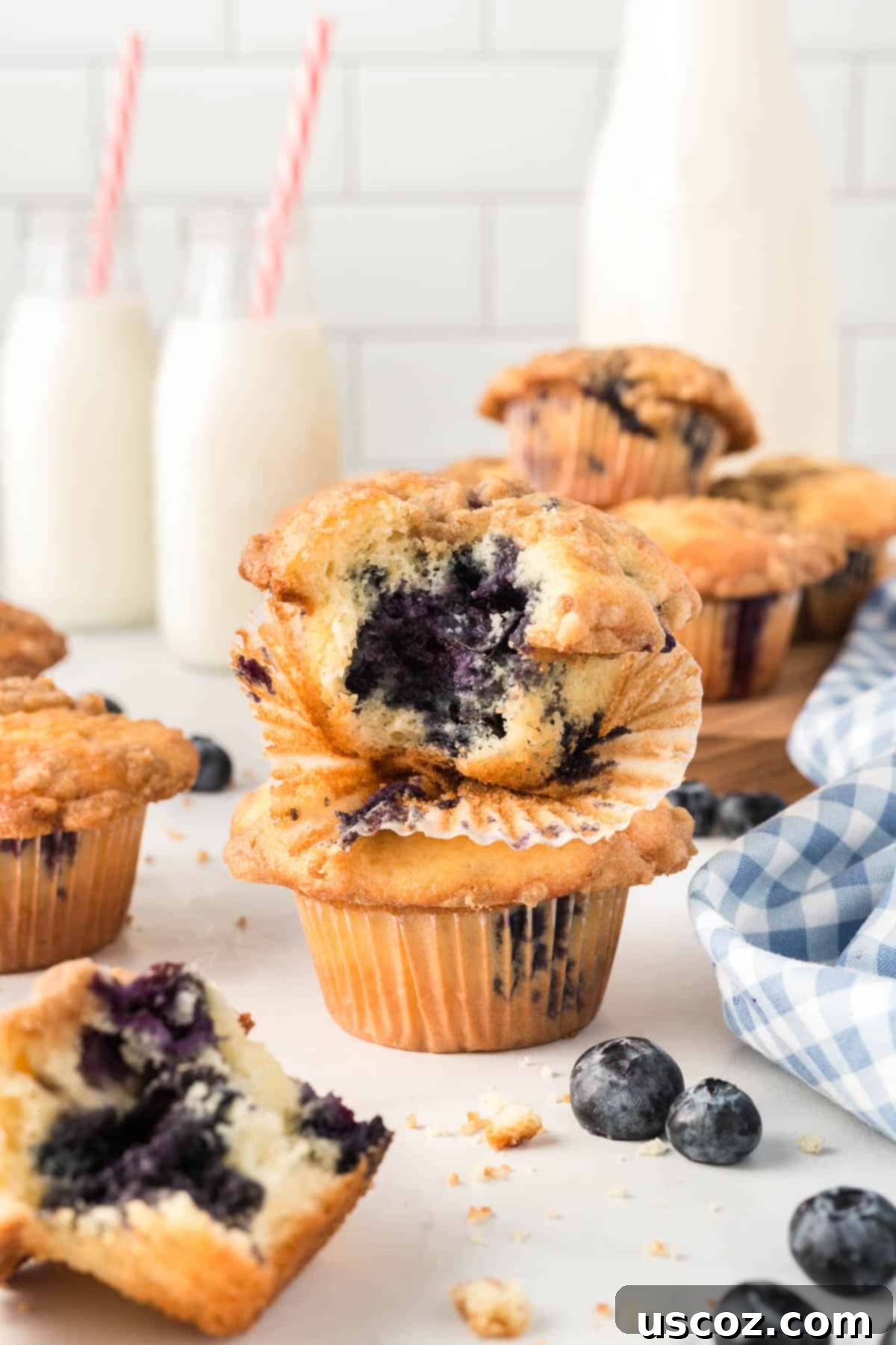 Effortless Cake Mix Blueberry Muffins 17 Another view of a delicious cake mix blueberry muffin with a bite taken out