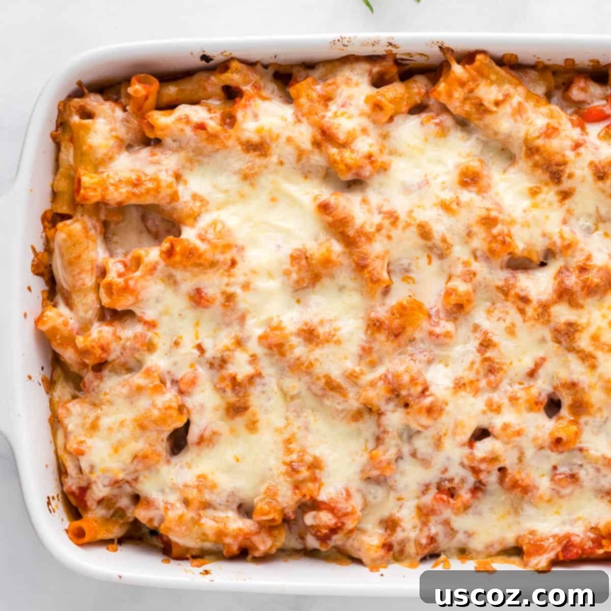 Cheesy Meatless Ziti Bake 19 A close-up of the bubbly, golden-brown top of a vegetarian baked ziti casserole