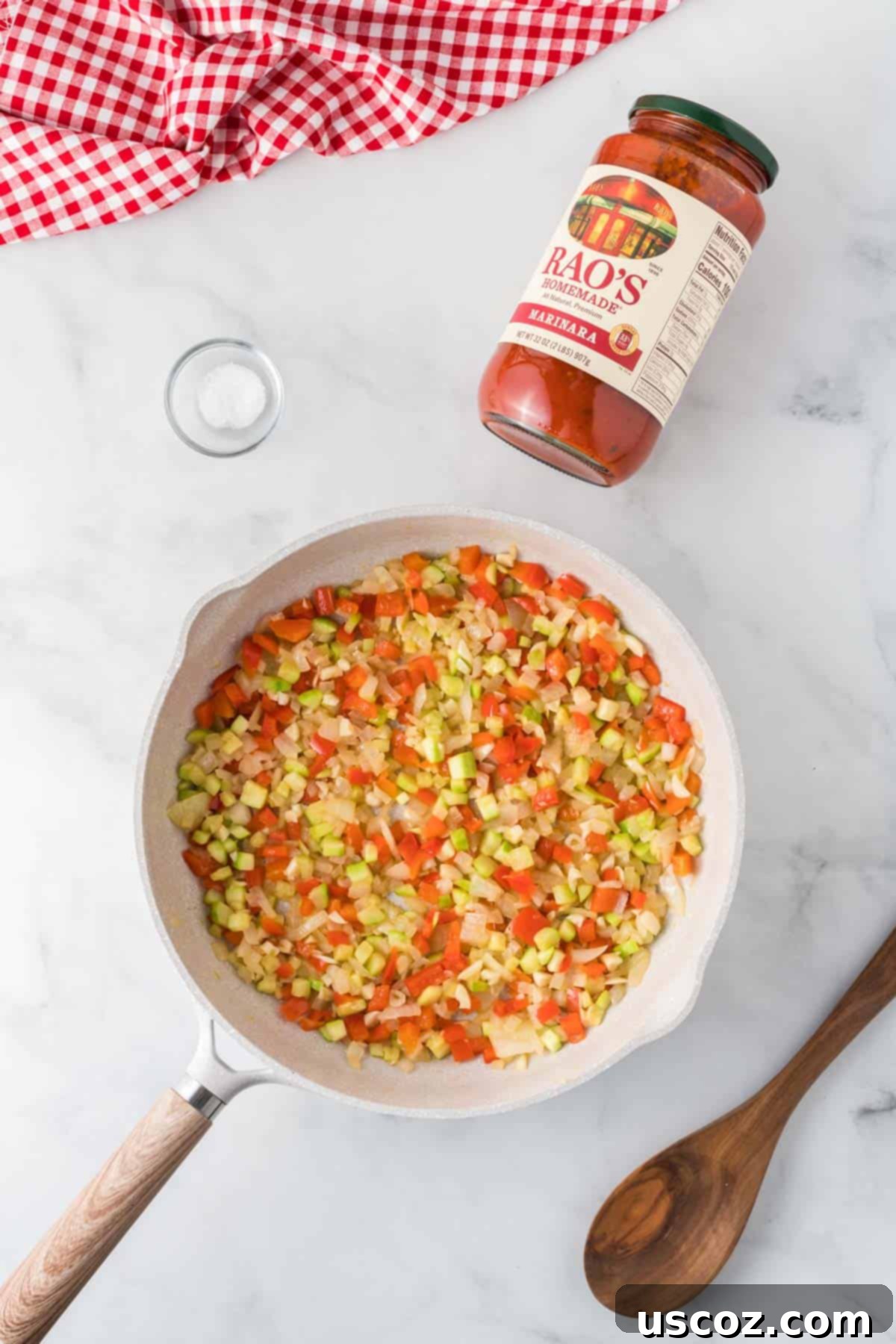 Cheesy Meatless Ziti Bake 6 Cooked vegetables in a skillet, ready for pasta sauce for vegetarian baked ziti
