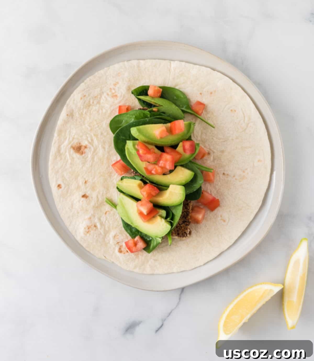 Savory Tofu Wraps 15 tofu wrap with tofu, spinach, avocado, tomato, and lemon