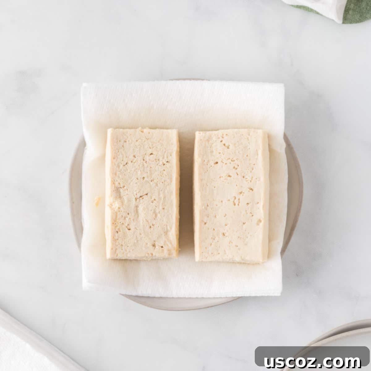 Savory Tofu Wraps 6 tofu blocks on a paper towel lined plate