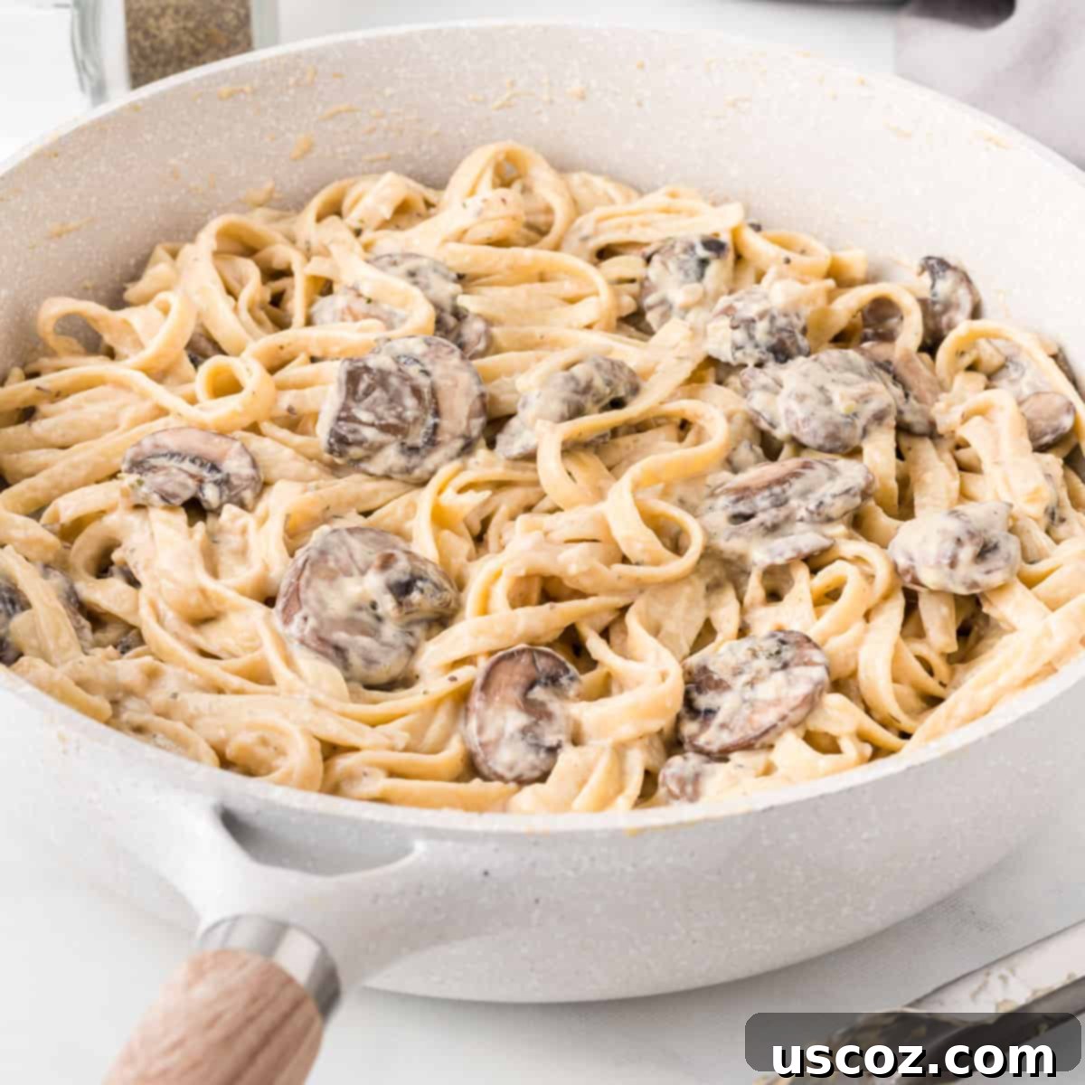 Velvety Mushroom Pasta 11 Another view of the creamy mushroom pasta in a skillet, emphasizing its rich texture and inviting presentation.