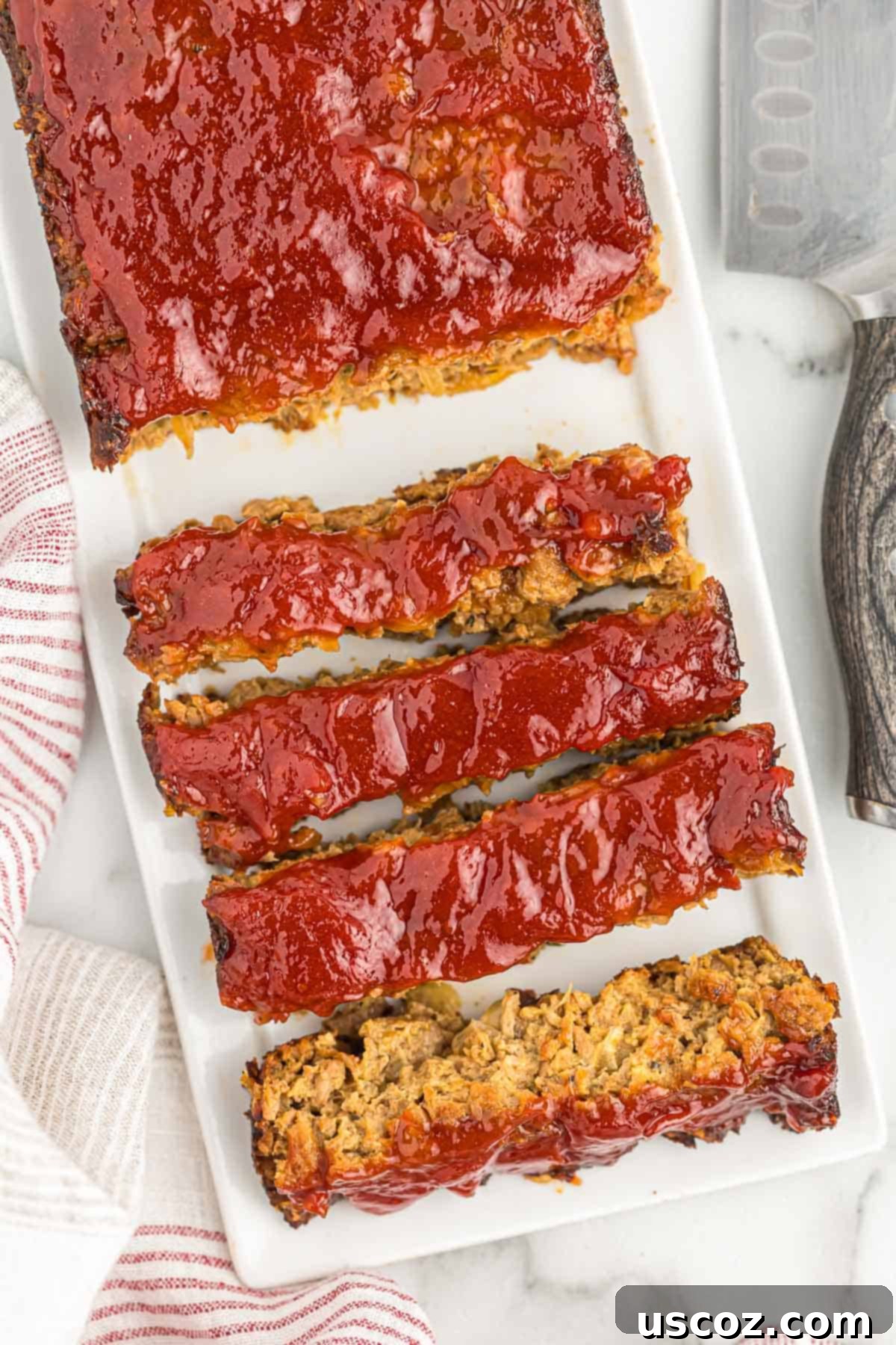 Hearty Plant-Based Meatloaf 4 Beautifully cut slices of vegetarian meatloaf, showcasing its firm texture and savory appeal
