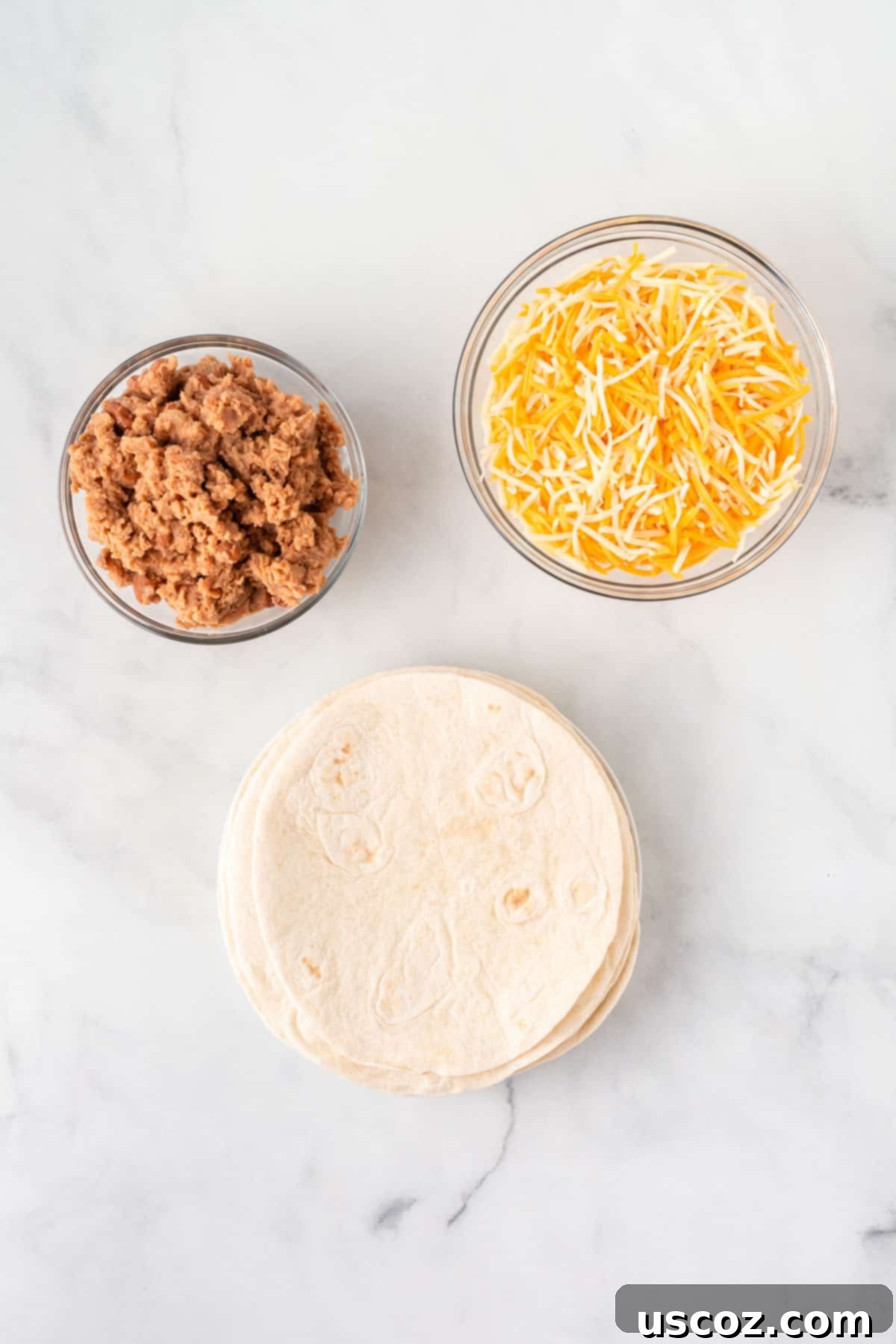 Air Fryer Quesadilla Perfection 3 soft taco shells, refried beans, and mexican cheese
