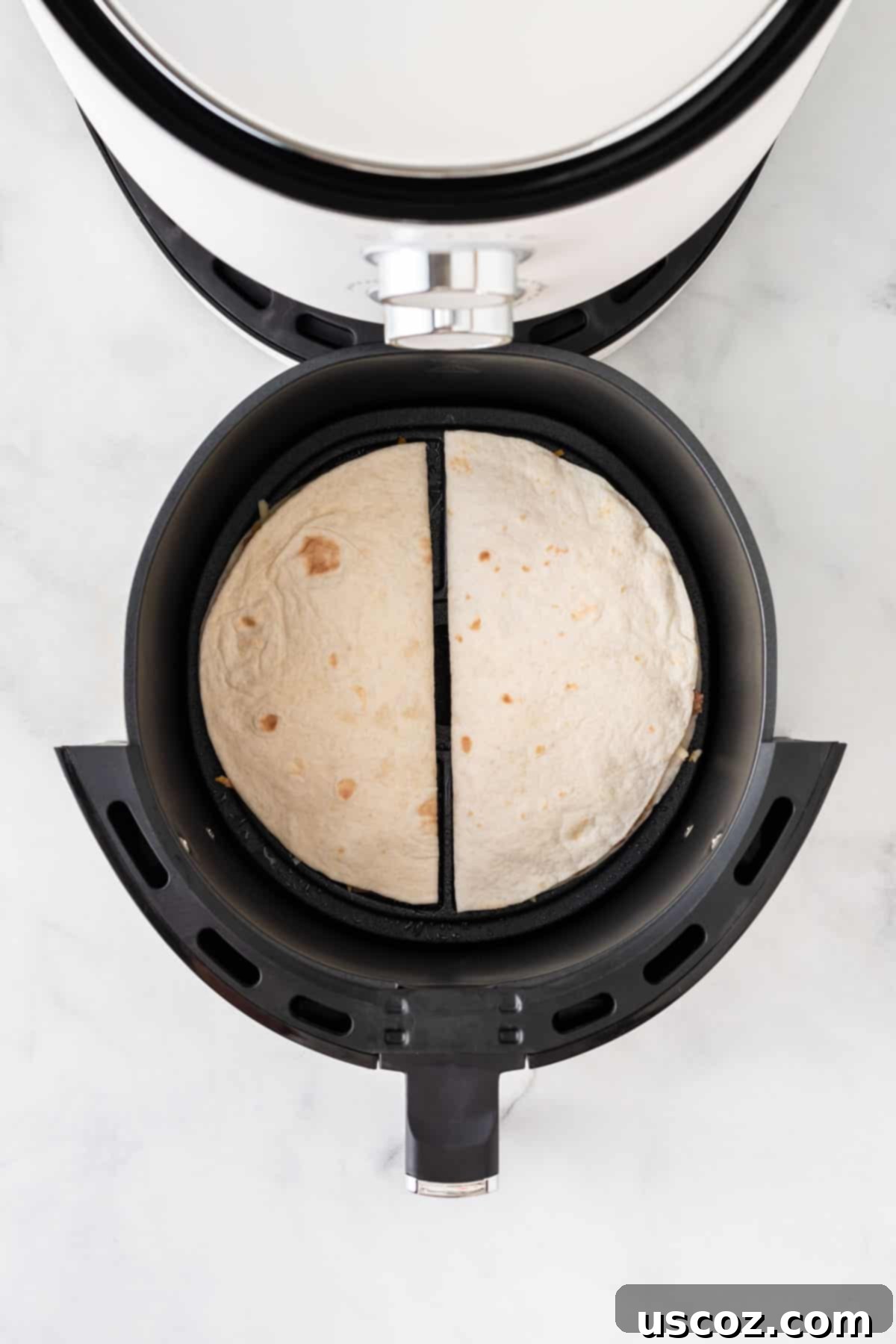 Air Fryer Quesadilla Perfection 6 quesadillas placed in the air fryer