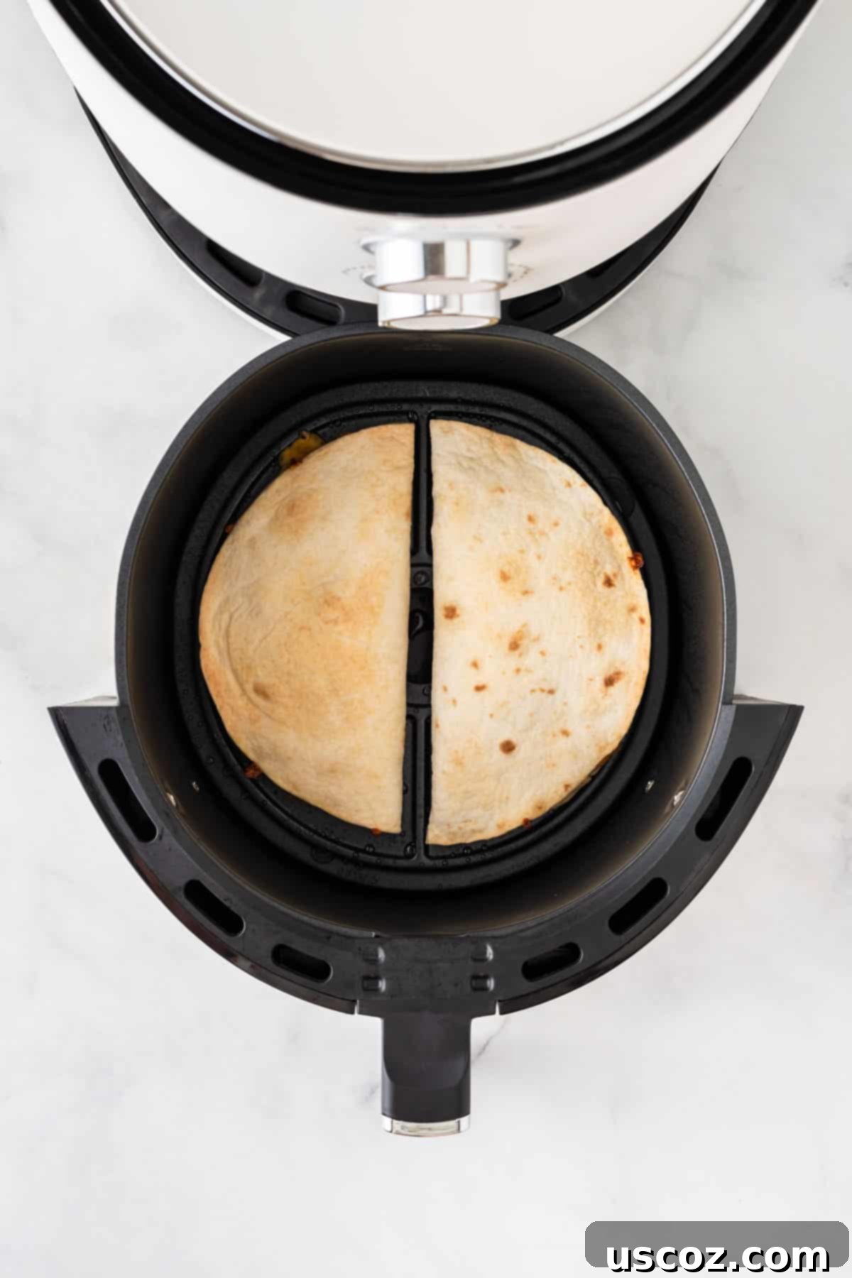 Air Fryer Quesadilla Perfection 7 crispy quesadillas inside the air fryer