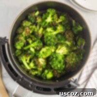 Perfectly Crispy Air Fryer Broccoli 8 Crispy air fried broccoli shown in a recipe card format, emphasizing its ease and deliciousness.