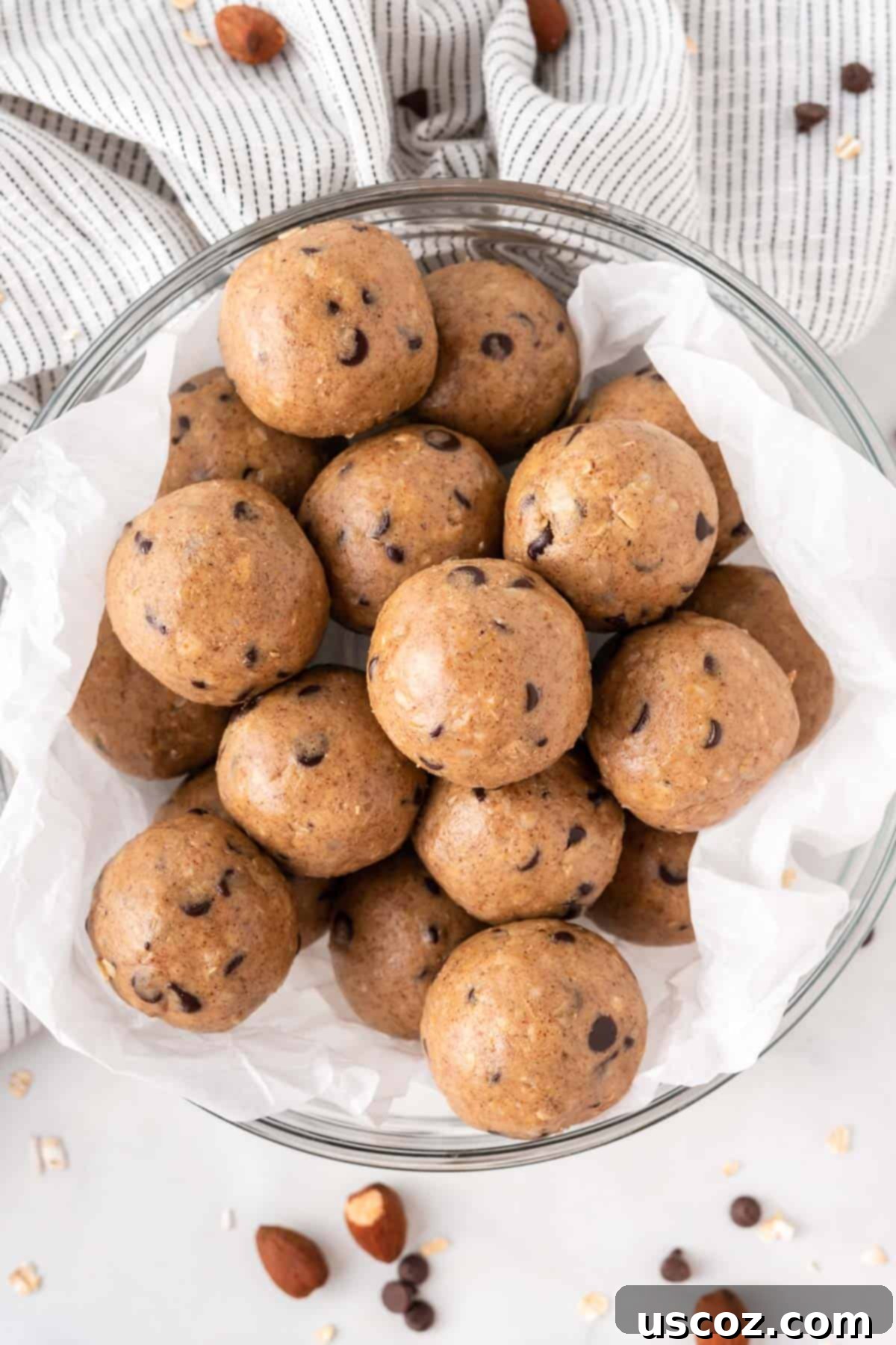 Almond Butter Power Bites 2 almond butter protein balls stacked in a bowl, ready to eat