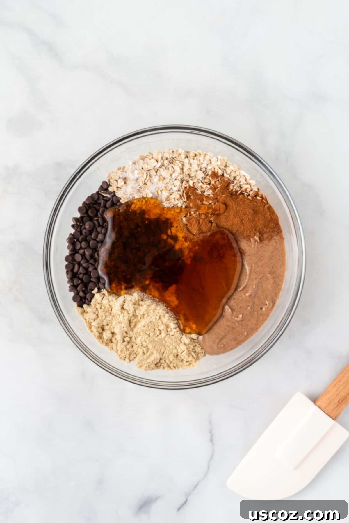 Almond Butter Power Bites 5 all energy ball ingredients mixed together in a bowl