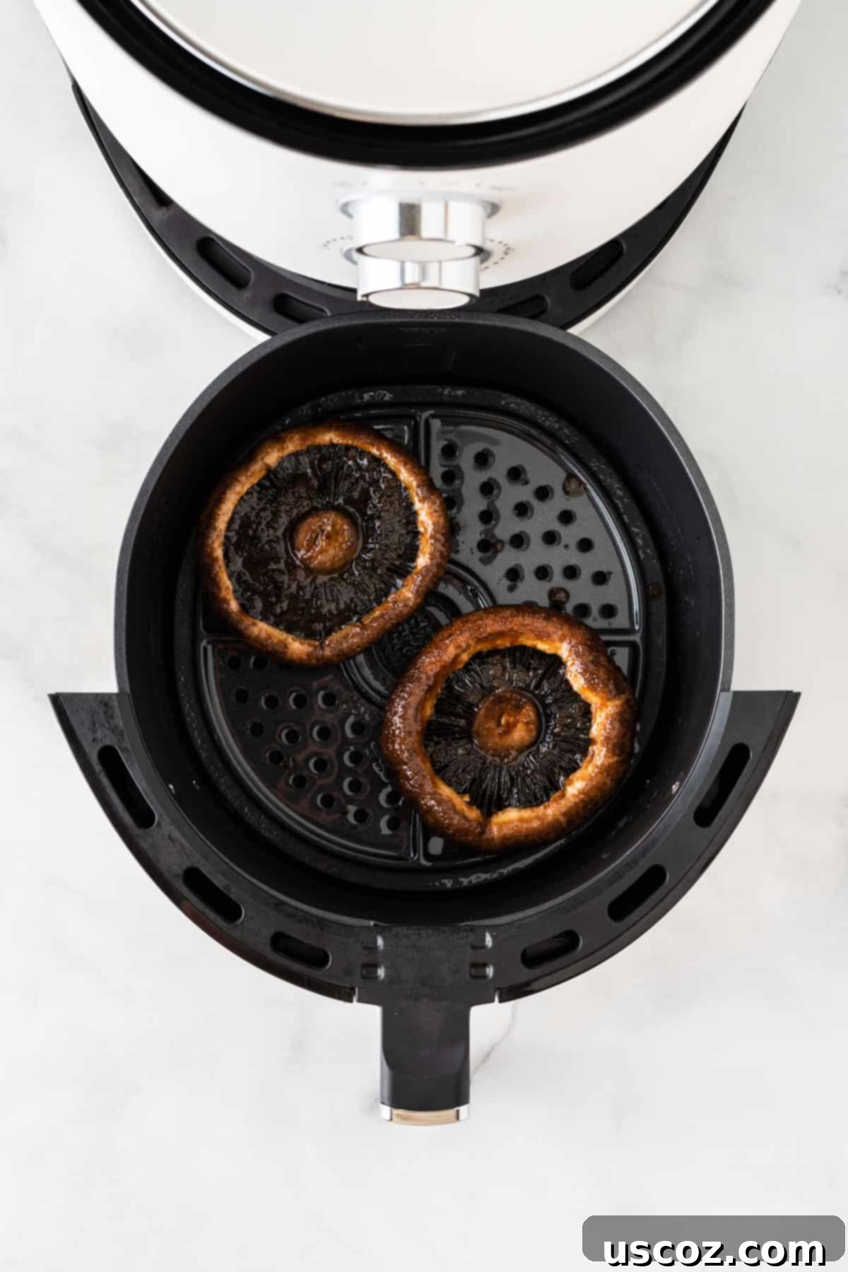 Crispy Air Fryer Portobello Mushrooms 7 air fried portobello mushrooms in the basket