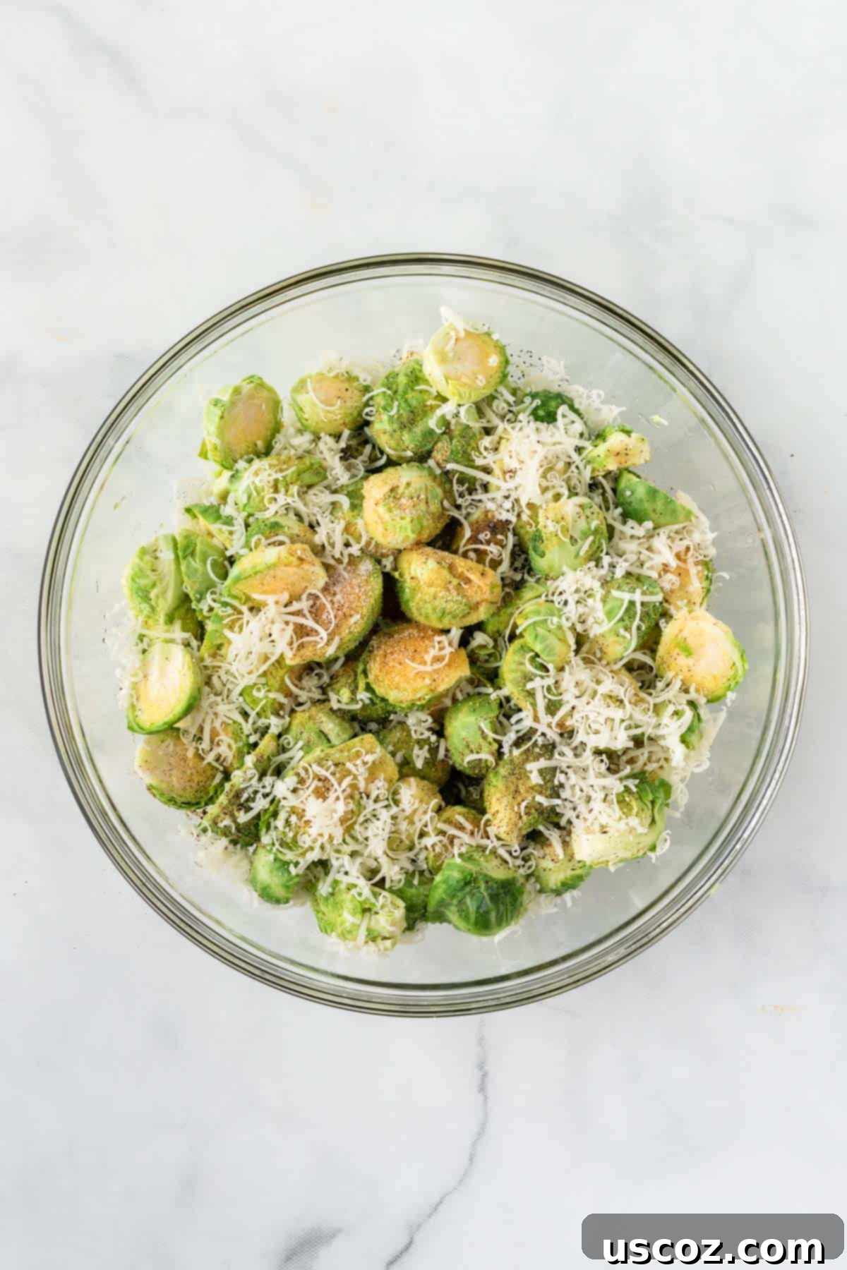 Crispy Air Fryer Brussels Sprouts 6 adding the spices and oil to the brussels sprouts