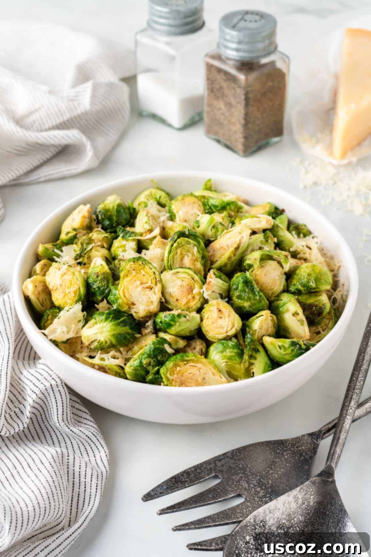 Crispy Air Fryer Brussels Sprouts 10 air fried brussels sprouts in a white bowl