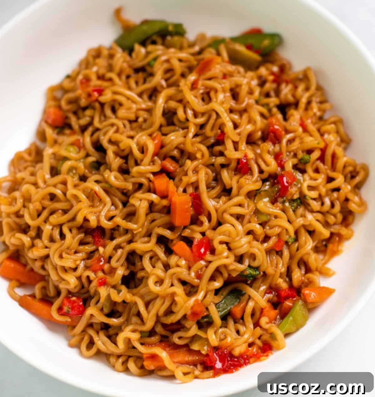 Effortless Instant Pot Stir Fry 9 stir fry in a bowl topped with sweet chili sauce