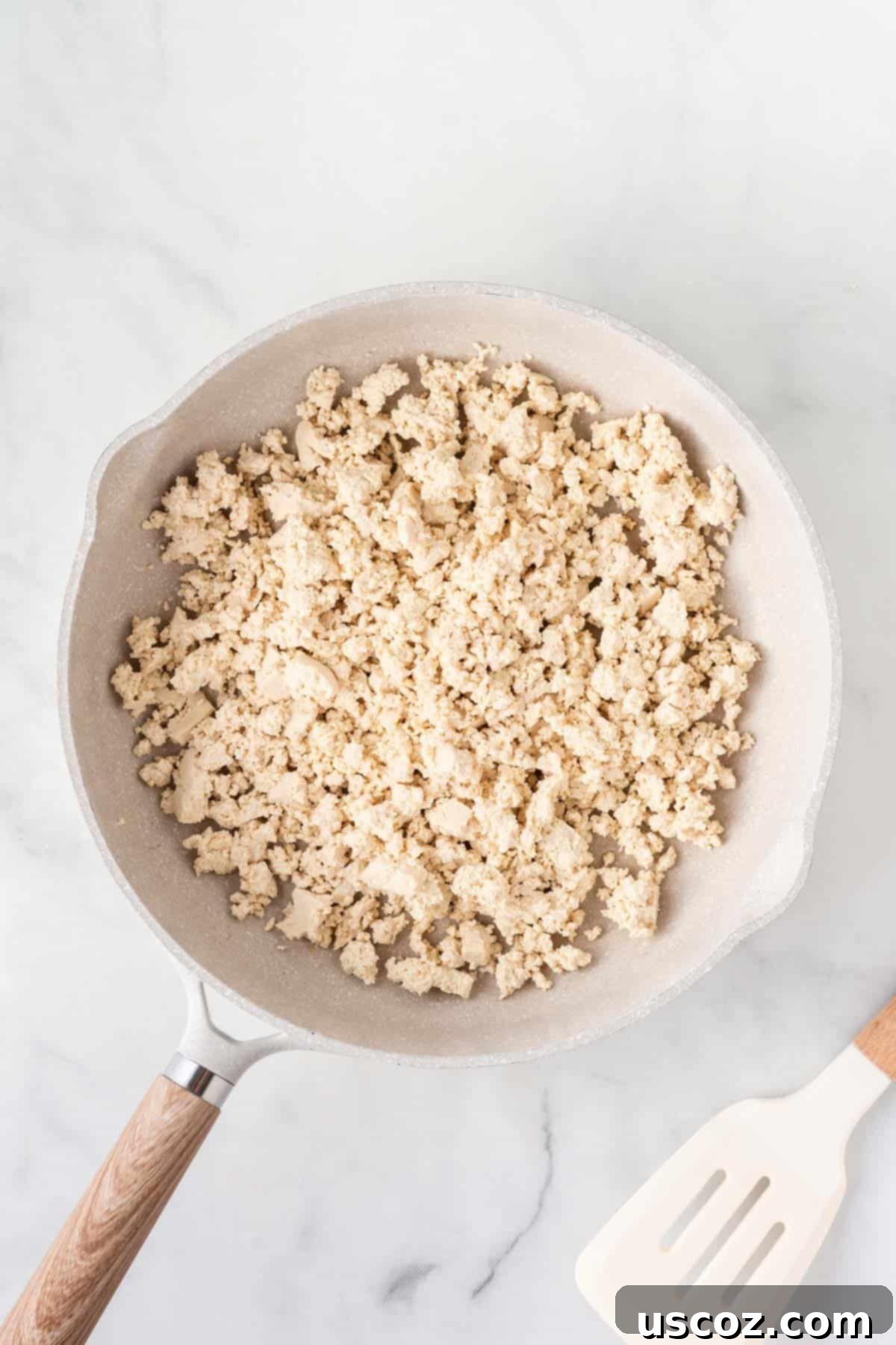 Easy Vegetarian Egg Roll Bowl 4 crumbled tofu in a skillet