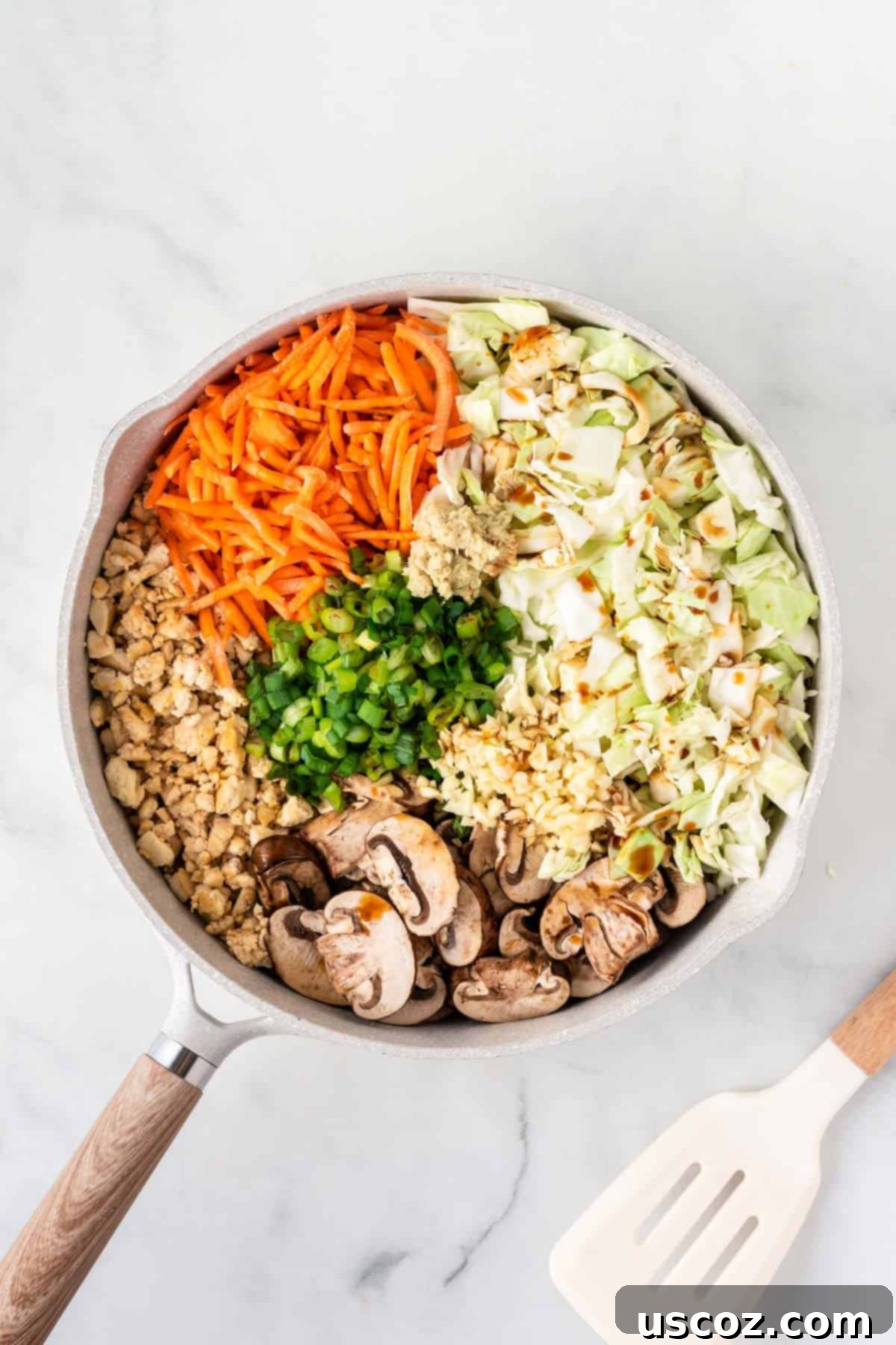 Easy Vegetarian Egg Roll Bowl 6 adding the rest of the veggies to the skillet