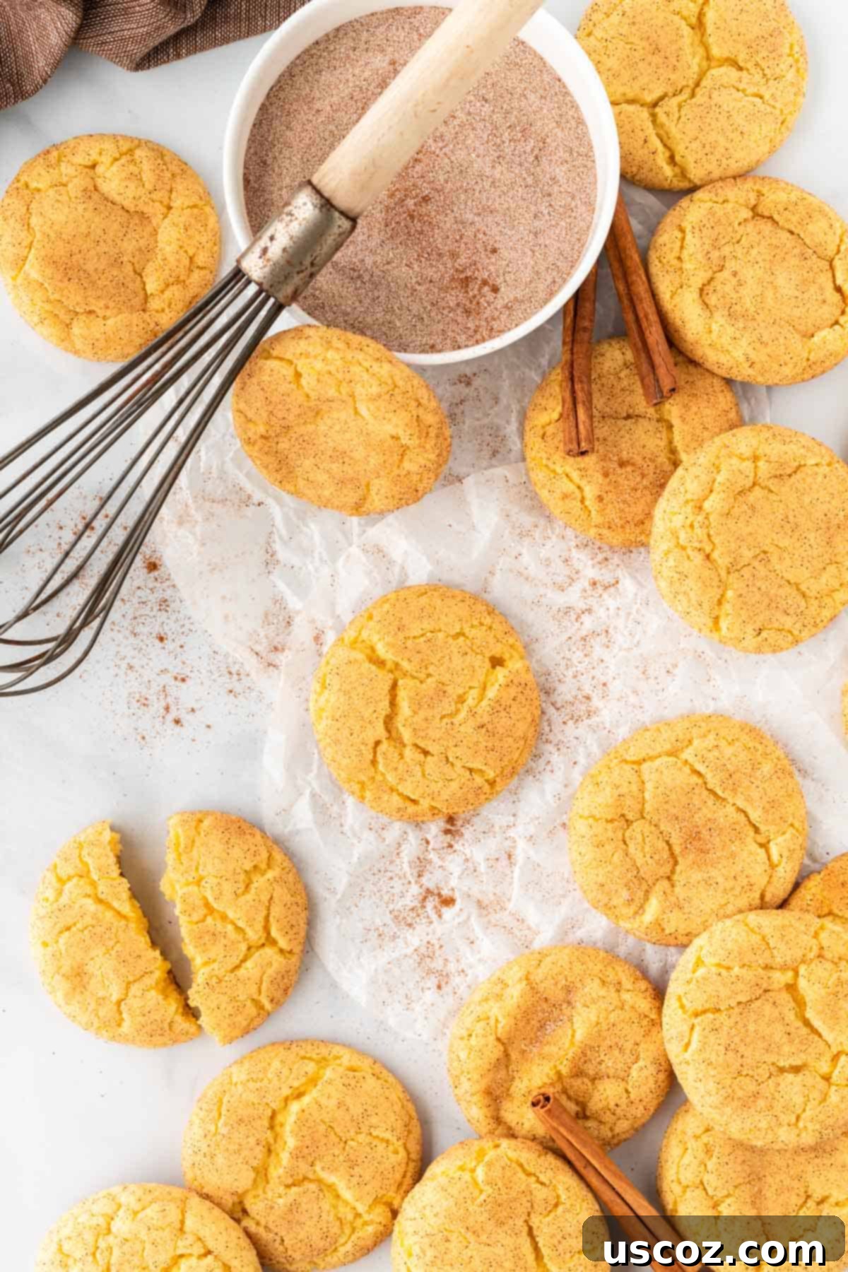Effortless Cake Mix Snickerdoodles 3 Close-up of a stack of fluffy cake mix snickerdoodles with cinnamon sugar on top