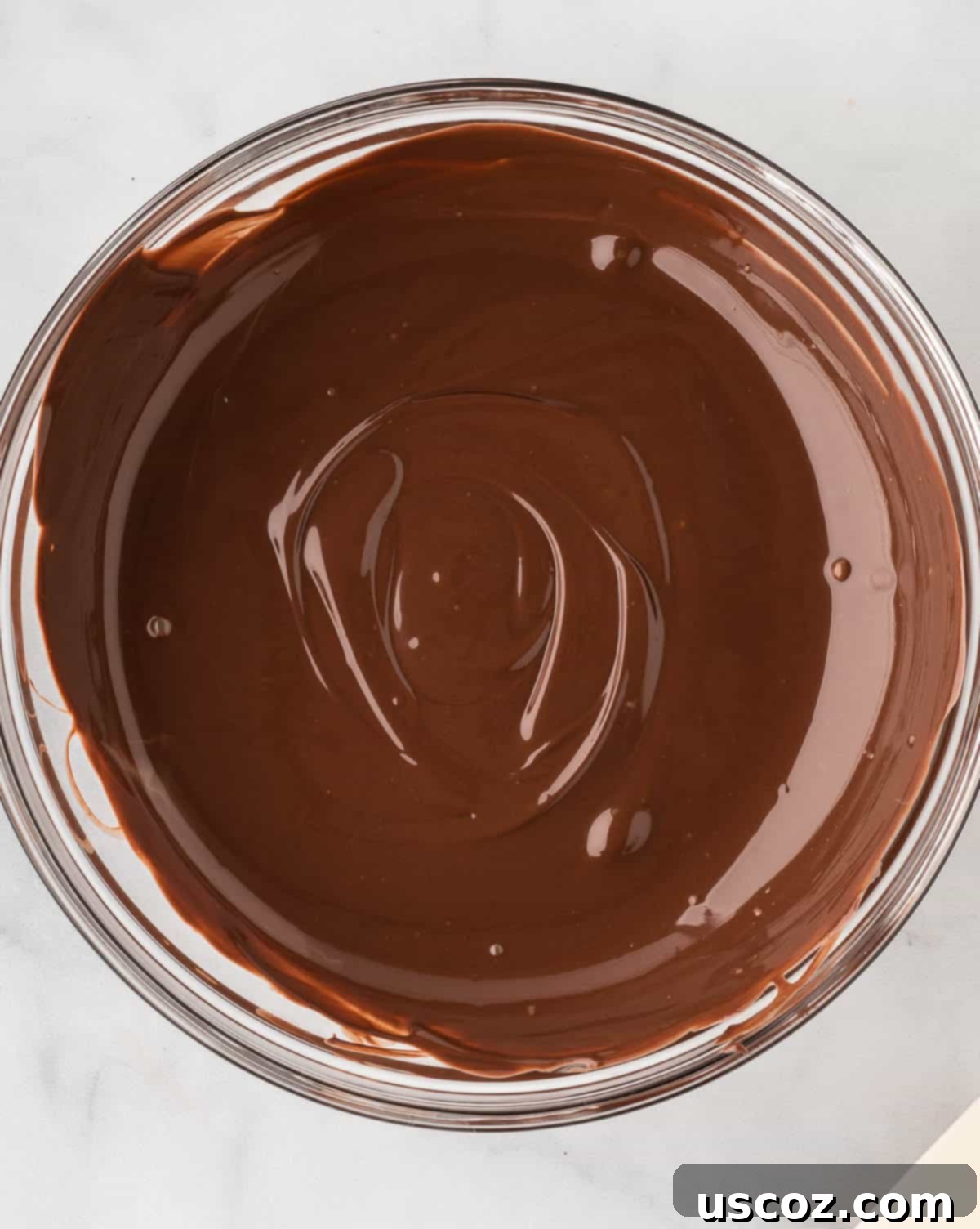 Spooky Oreo Truffles 11 Smooth, melted dark chocolate wafers in a bowl