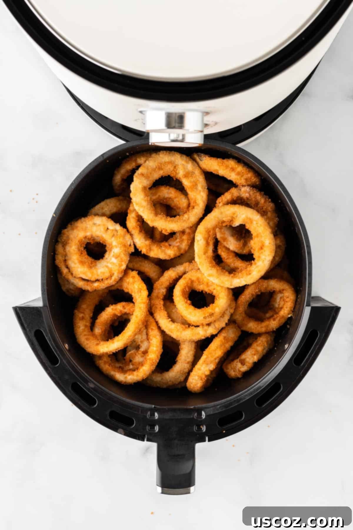 Crispy Air Fryer Frozen Onion Rings 4 onion rings in the air fryer