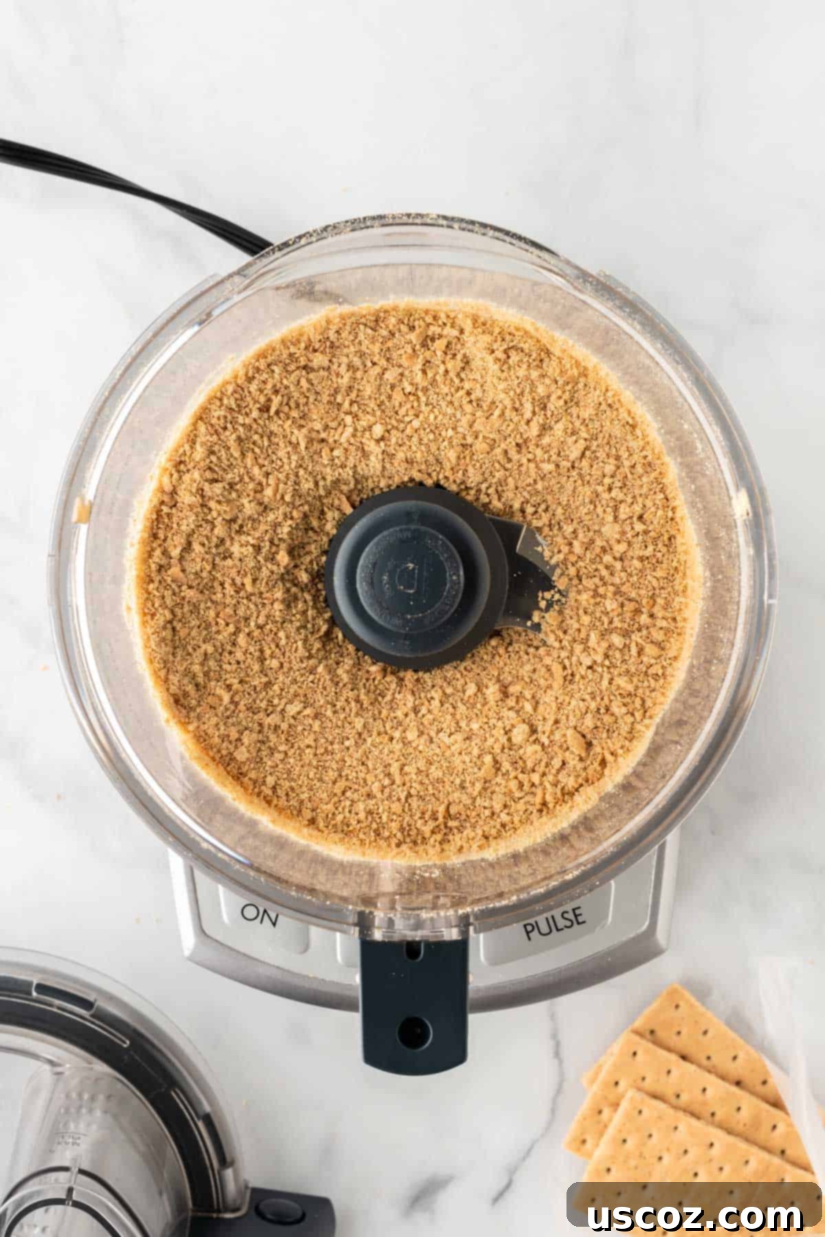 Creamy No-Bake Cheesecake Bliss 6 finely crushed graham cracker crumbs in a food processor bowl