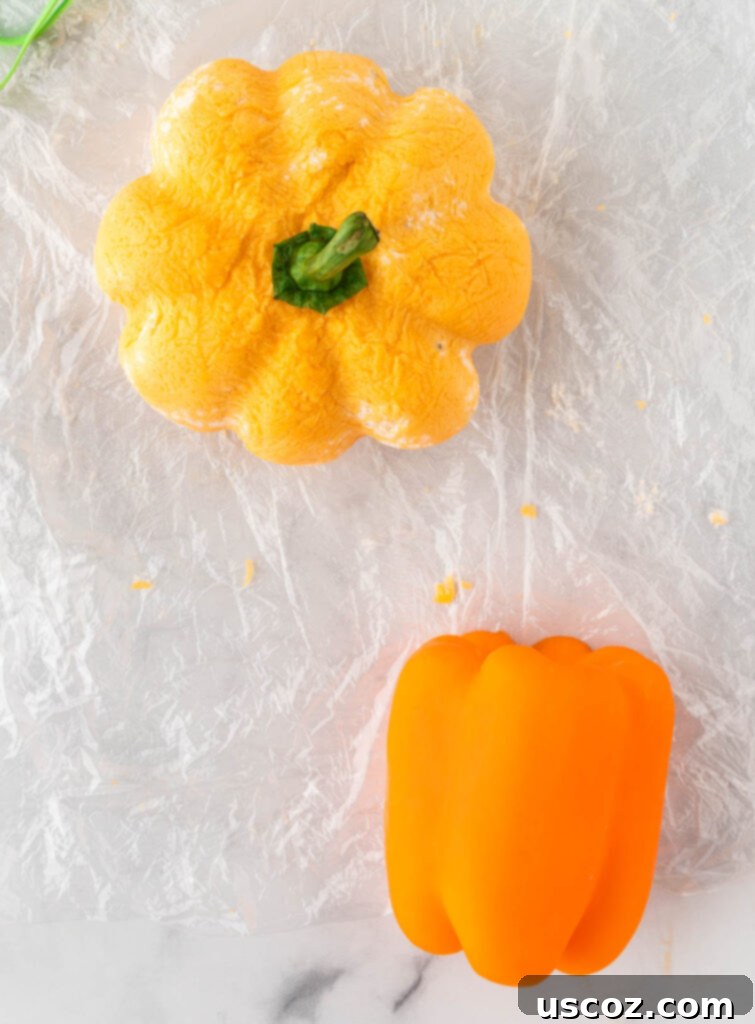 Spiced Pumpkin Cheese Ball 14 pumpkin shaped cheese ball with a bell pepper stem
