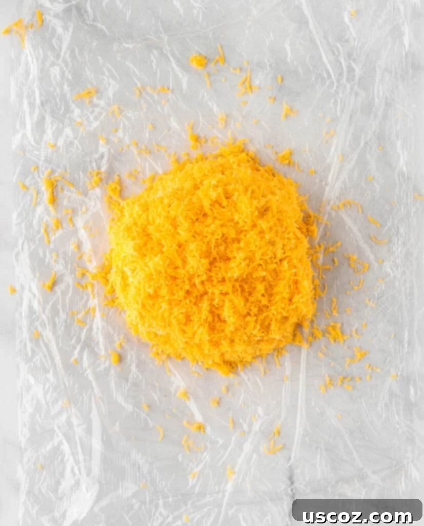 Spiced Pumpkin Cheese Ball 9 cheese ball coated in cheddar cheese