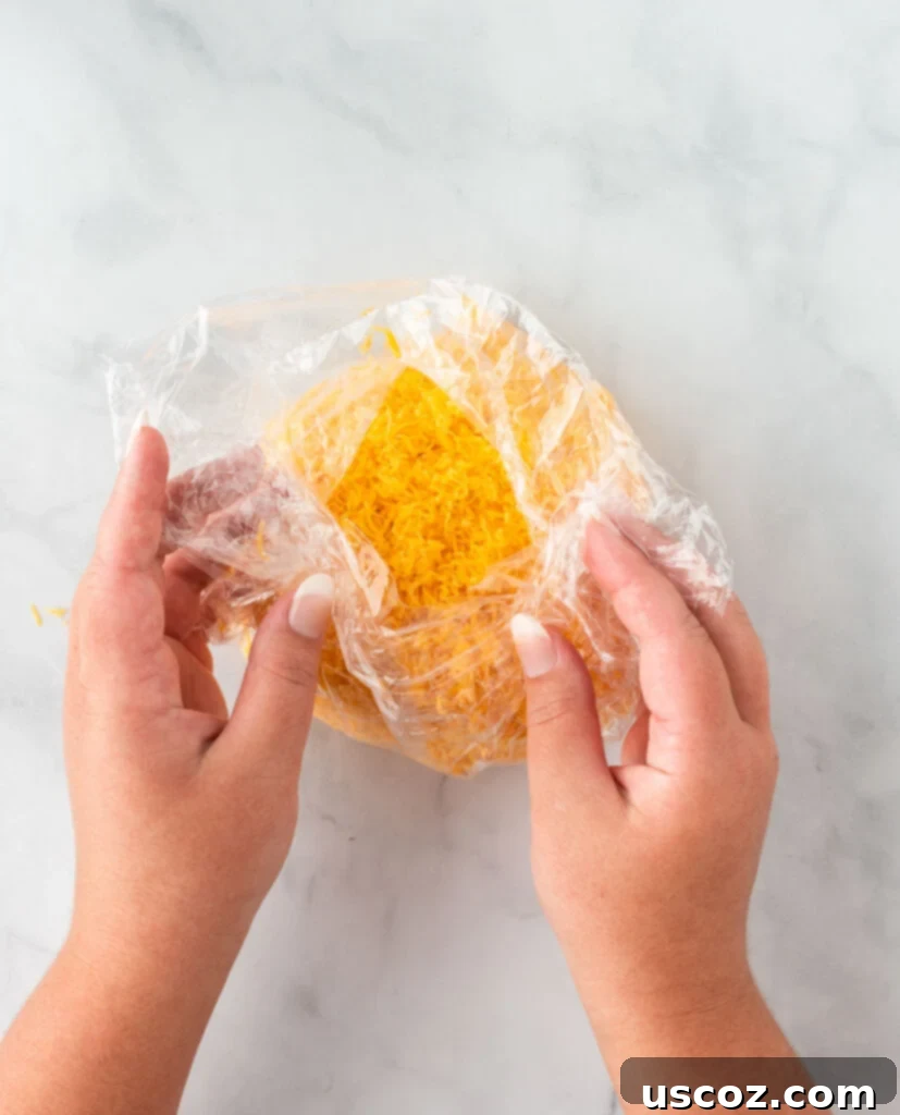 Spiced Pumpkin Cheese Ball 10 wrapping the cheese ball with cling wrap