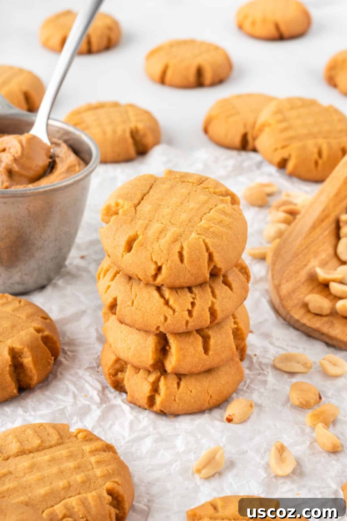 Easy Cake Mix Peanut Butter Cookies 14 Four perfectly stacked cake mix peanut butter cookies, showcasing their soft texture.