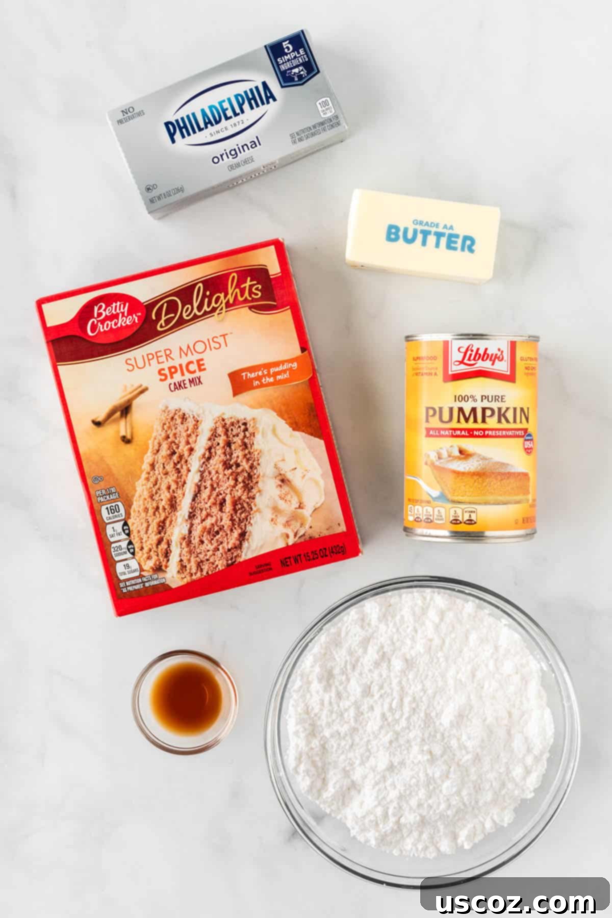 Easy Cake Mix Pumpkin Bars 4 ingredients needed to make cake mix pumpkin bars, neatly arranged on a counter