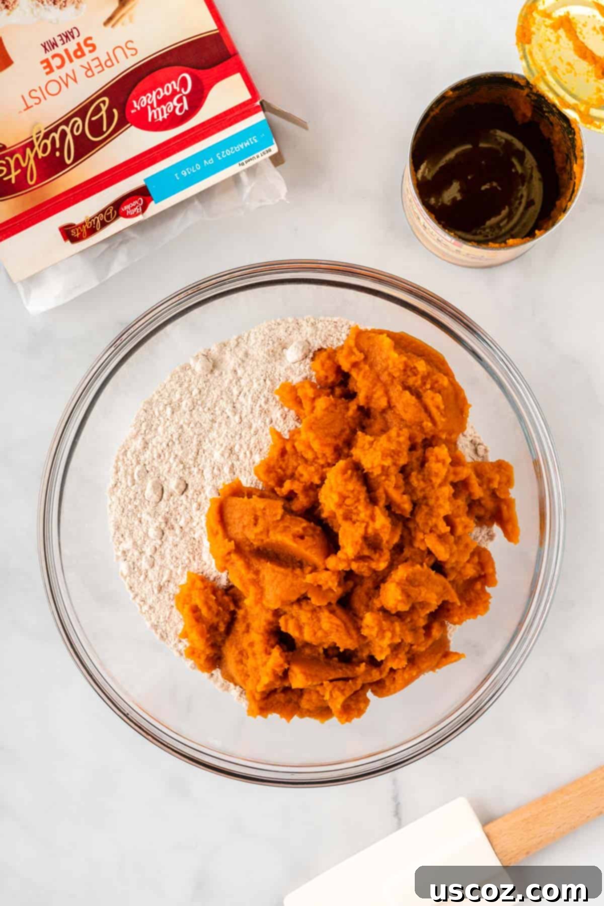 Easy Cake Mix Pumpkin Bars 5 pumpkin puree and spice cake mix in a mixing bowl before combining
