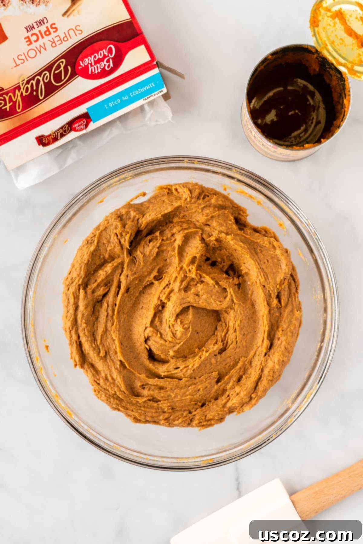 Easy Cake Mix Pumpkin Bars 6 thick pumpkin bar batter in a mixing bowl after combining