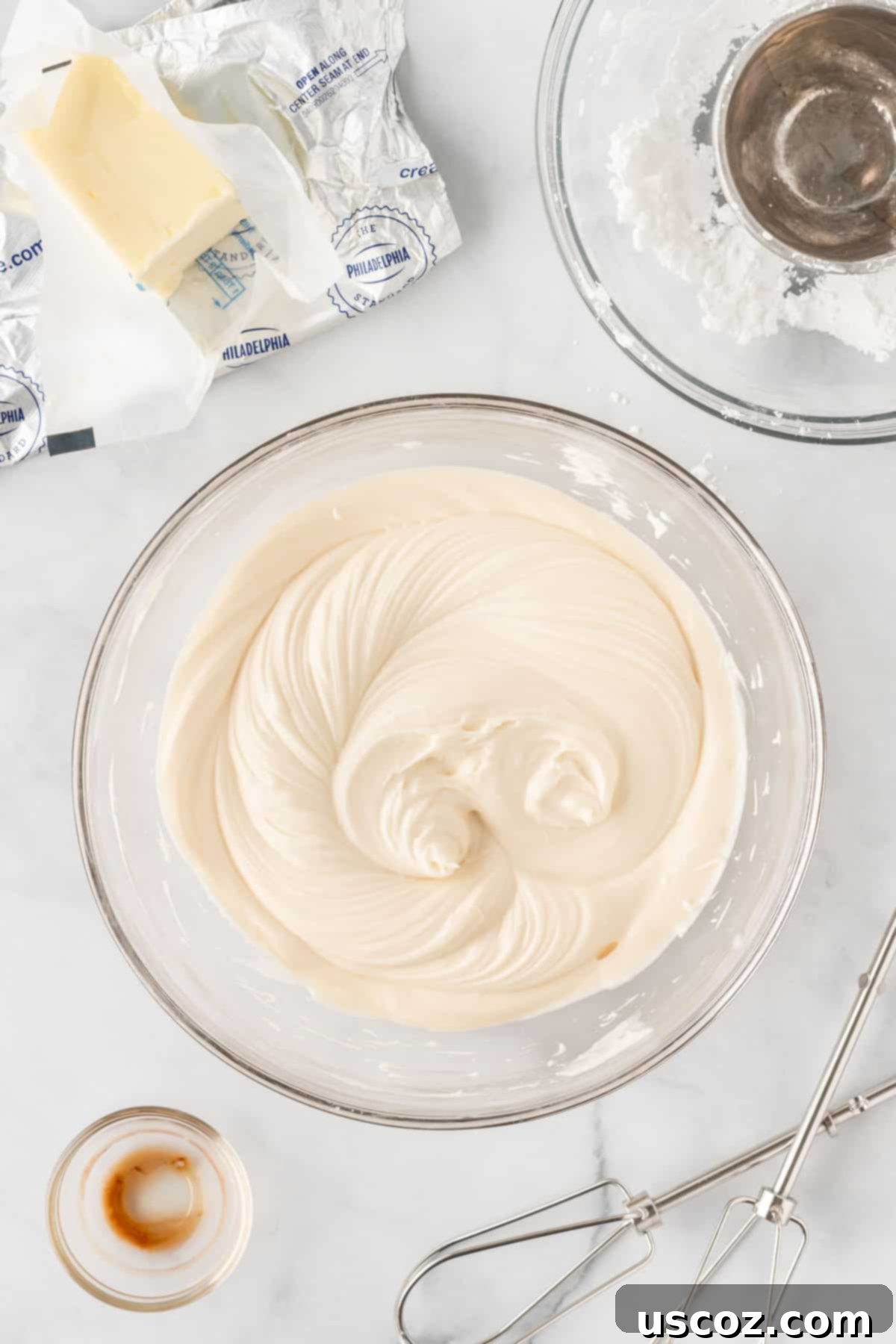 Easy Cake Mix Pumpkin Bars 8 smooth and creamy cream cheese frosting in a mixing bowl