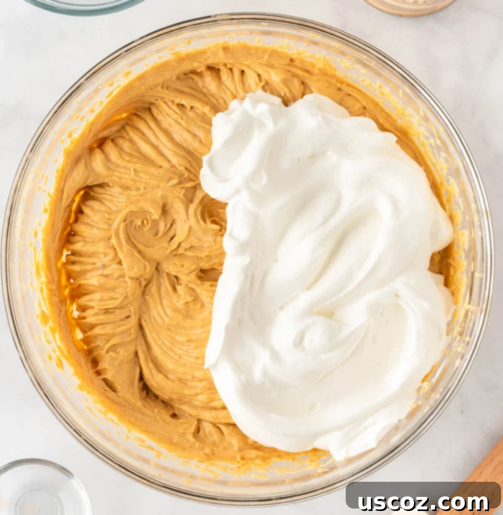 Easy No-Bake Pumpkin Cheesecake Bars 13 fully combined pumpkin cheesecake filling, smooth and airy