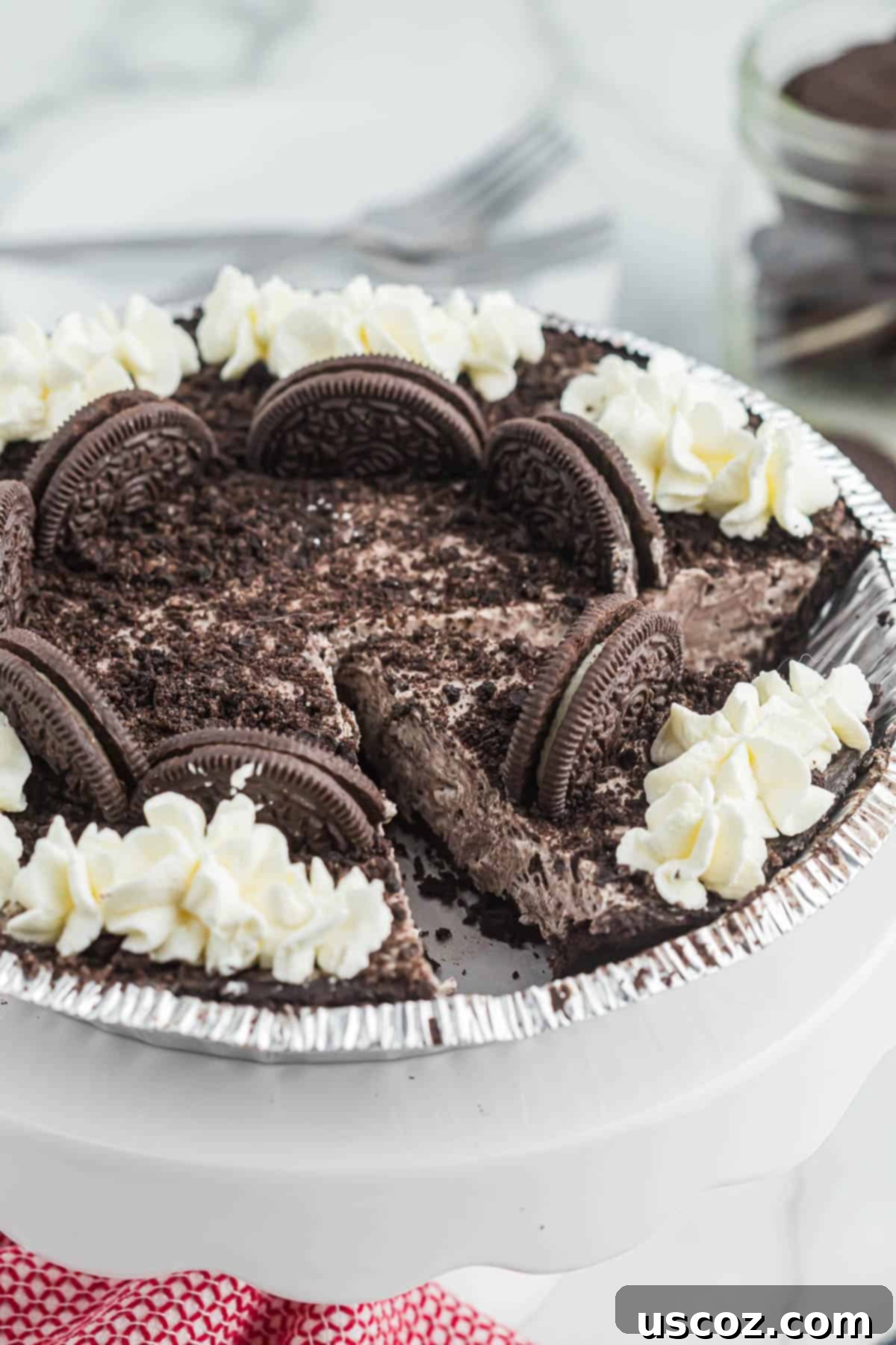 Oreo Bliss Pie 11 Multiple slices of No-Bake Oreo Pie neatly cut and arranged on a serving plate, showing off the thick, creamy filling and dark crust.