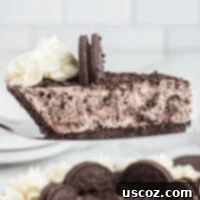 Oreo Bliss Pie 15 A close-up shot of a perfect slice of No-Bake Oreo Pie on a plate.