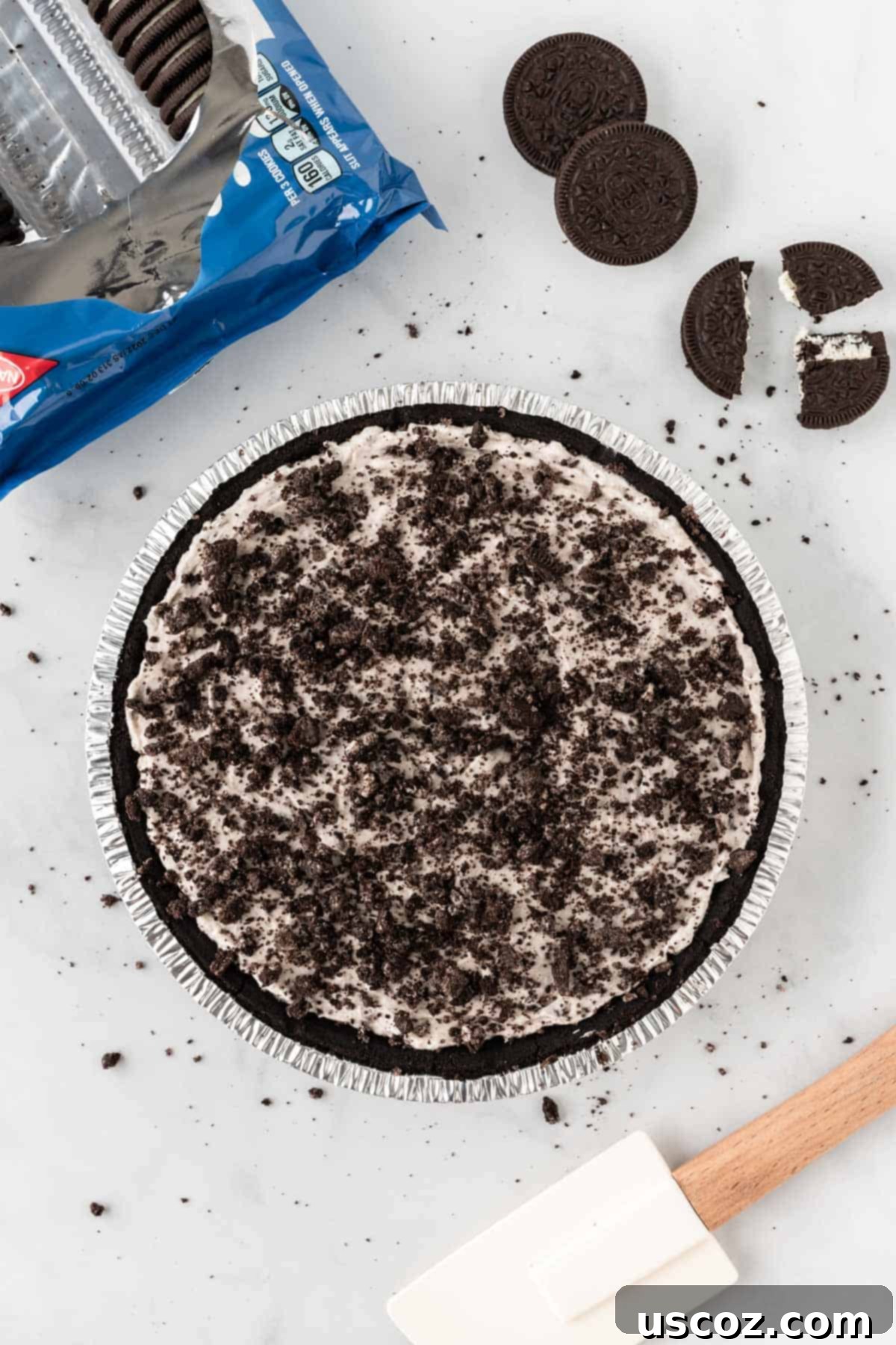 Oreo Bliss Pie 9 The finished No-Bake Oreo Pie, beautifully topped with generous crushed Oreos, ready to be chilled and served.
