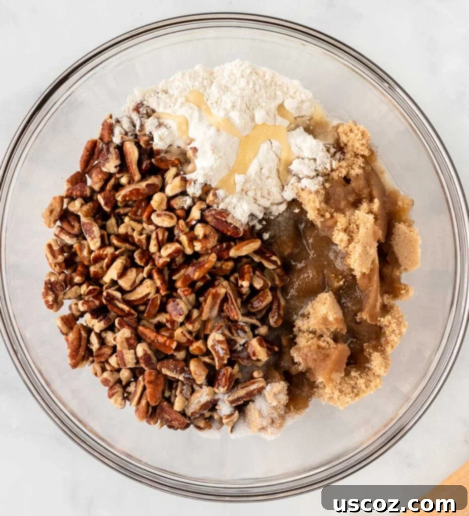 Golden Sweet Potato Marshmallow Bake 12 pecan crumble ingredients in a mixing bowl