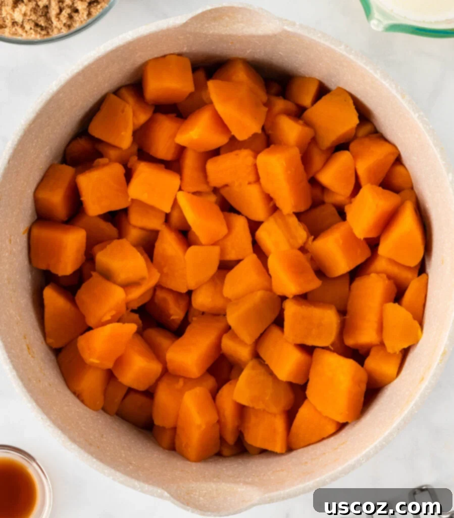 Golden Sweet Potato Marshmallow Bake 8 boiled sweet potatoes in a sauce pan
