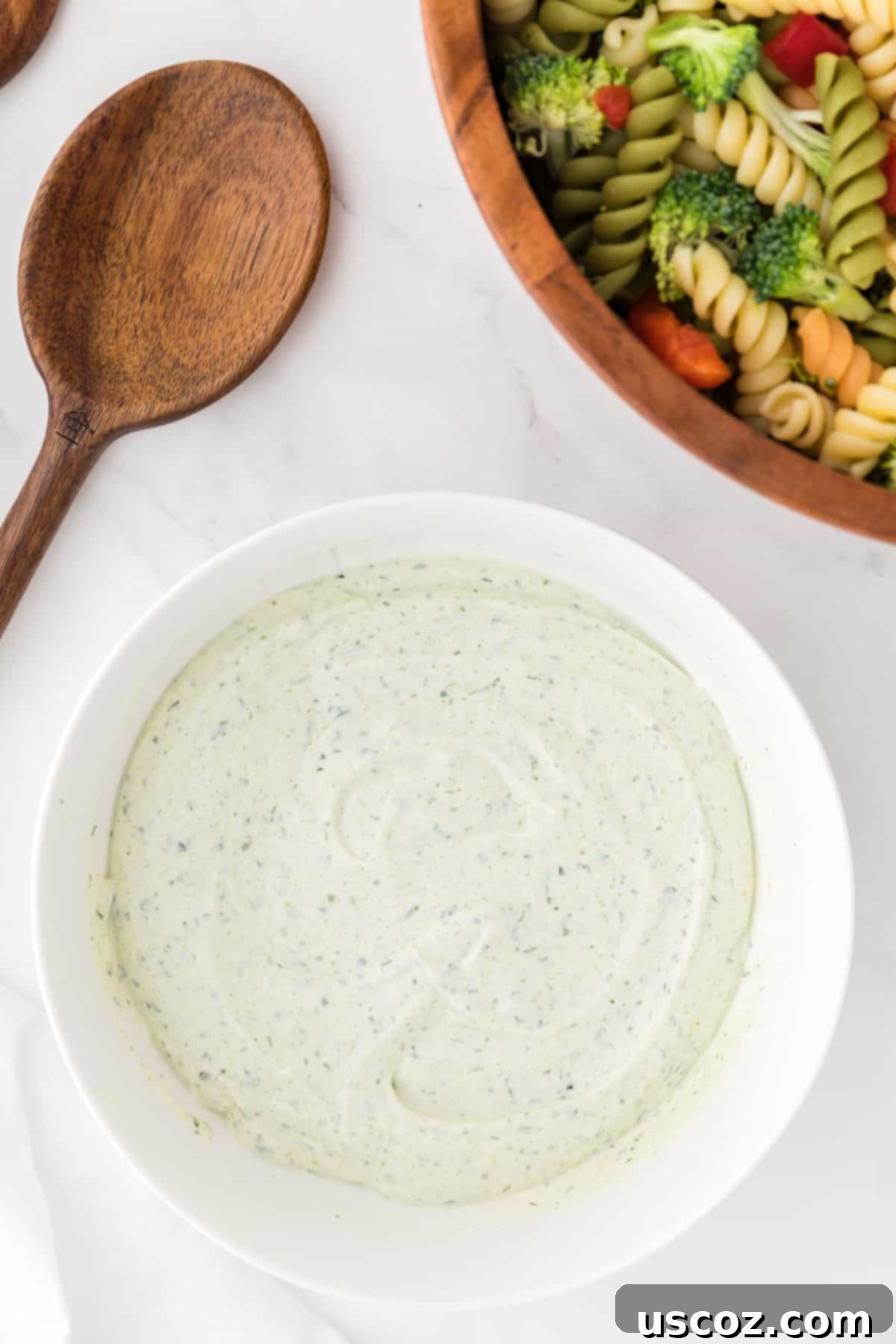 Creamy Ranch Pasta Salad 10 ranch pasta salad dressing in a bowl