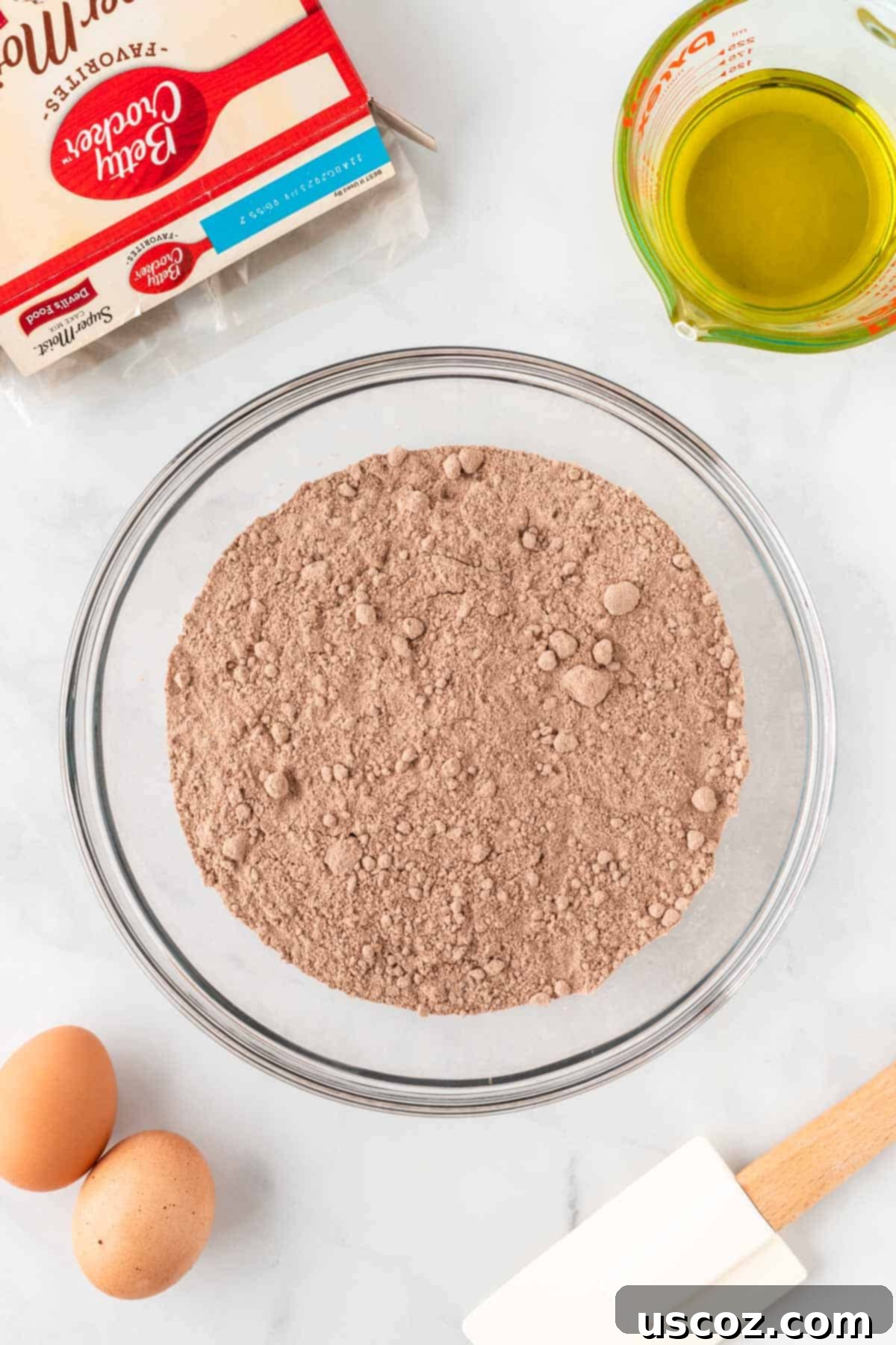Irresistible Cake Mix Crinkles 5 chocolate cake mix in a bowl