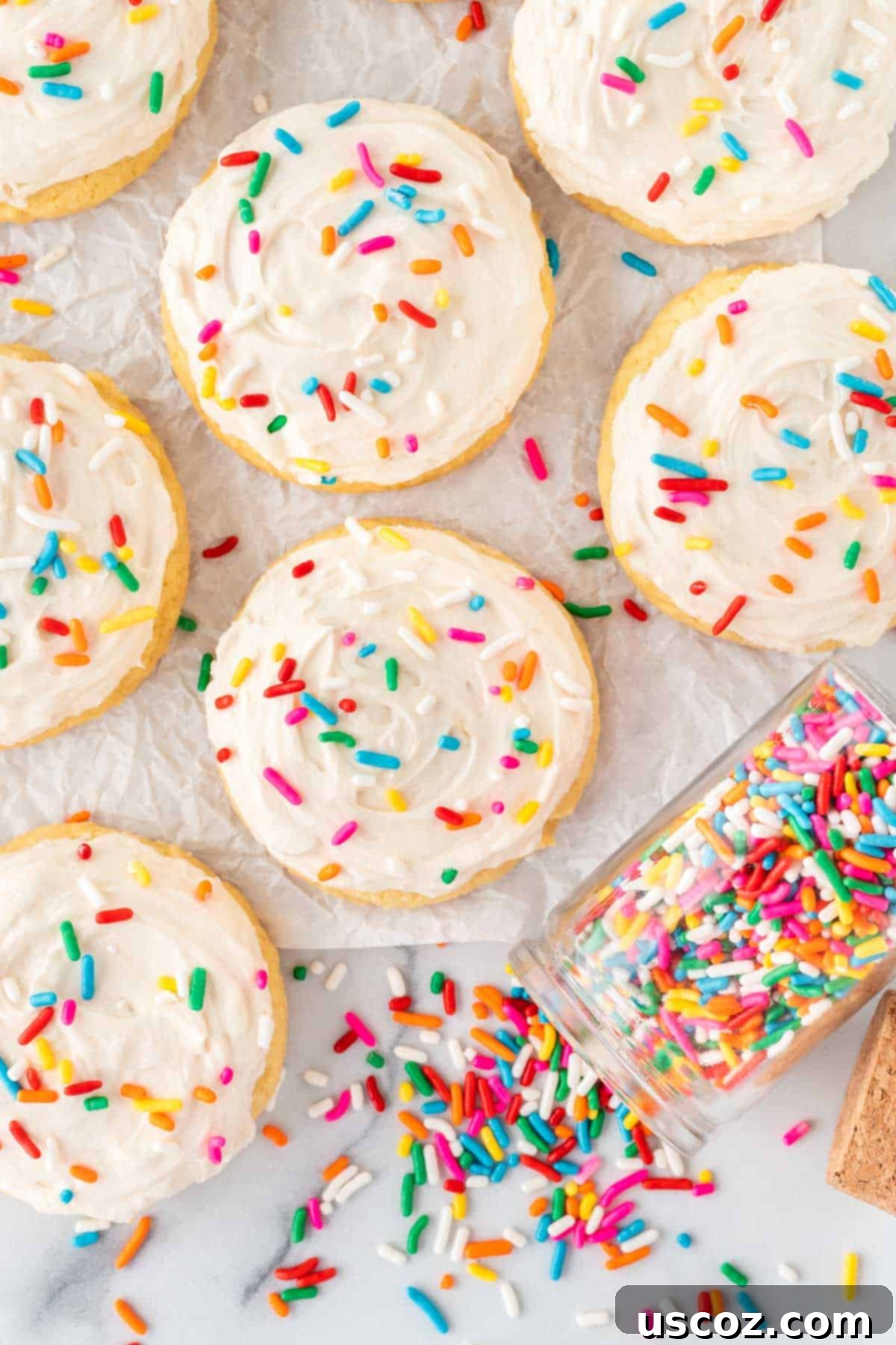 Effortless Cake Mix Sugar Cookies 12 cake mix sugar cookies topped with frosting and sprinkles