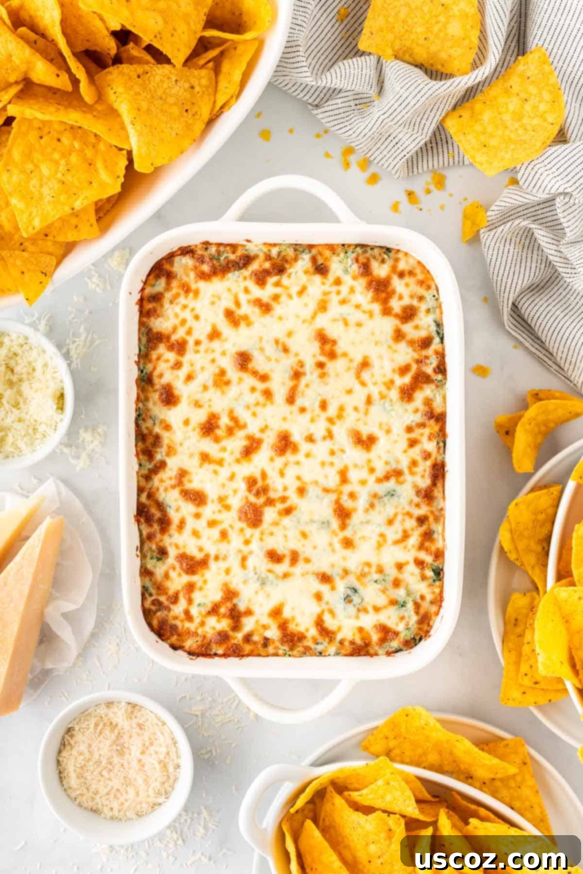 Decadent Creamy Spinach Dip 3 creamy baked spinach dip in a baking dish