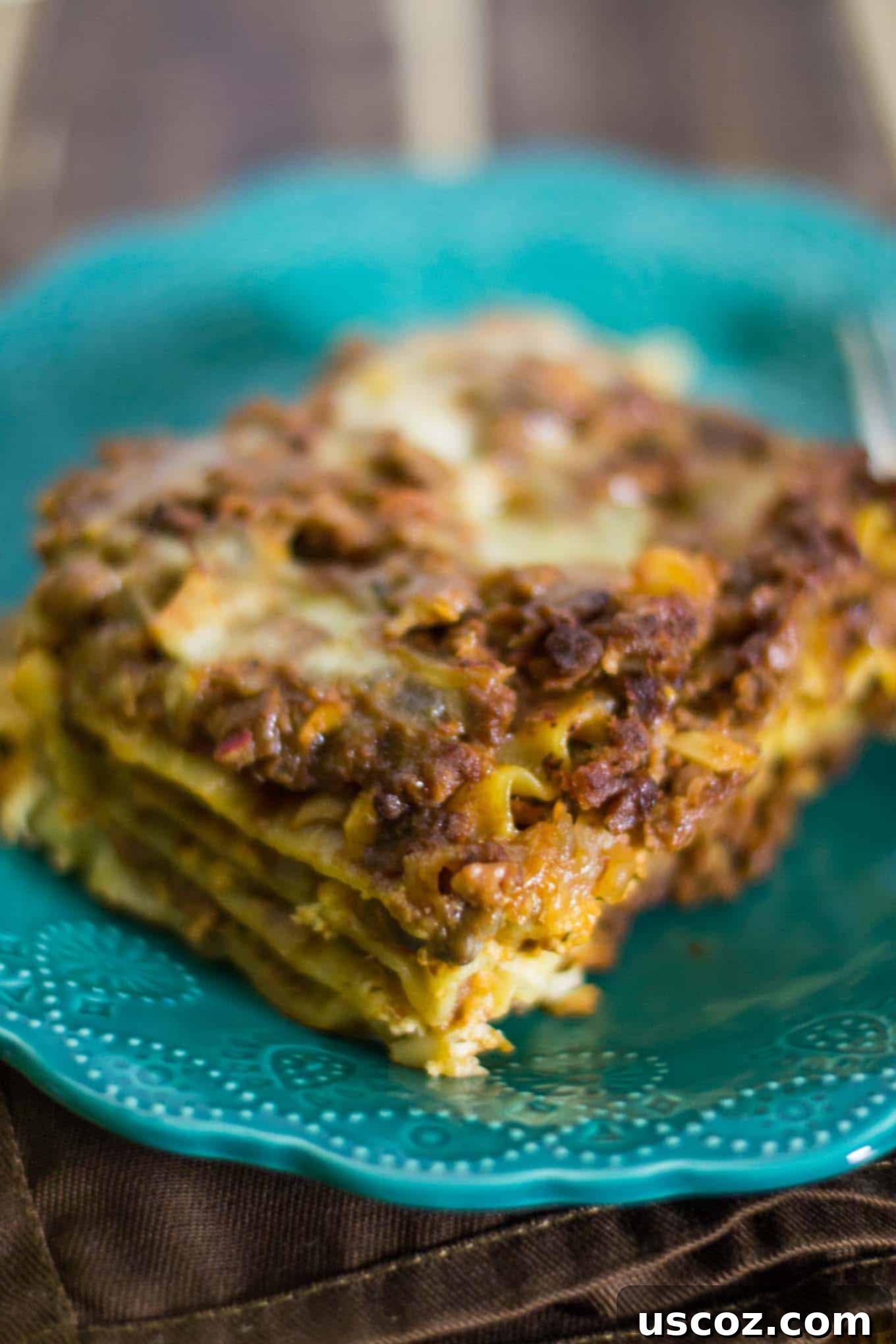 Baked vegetarian lasagna with melted cheese, ready to serve