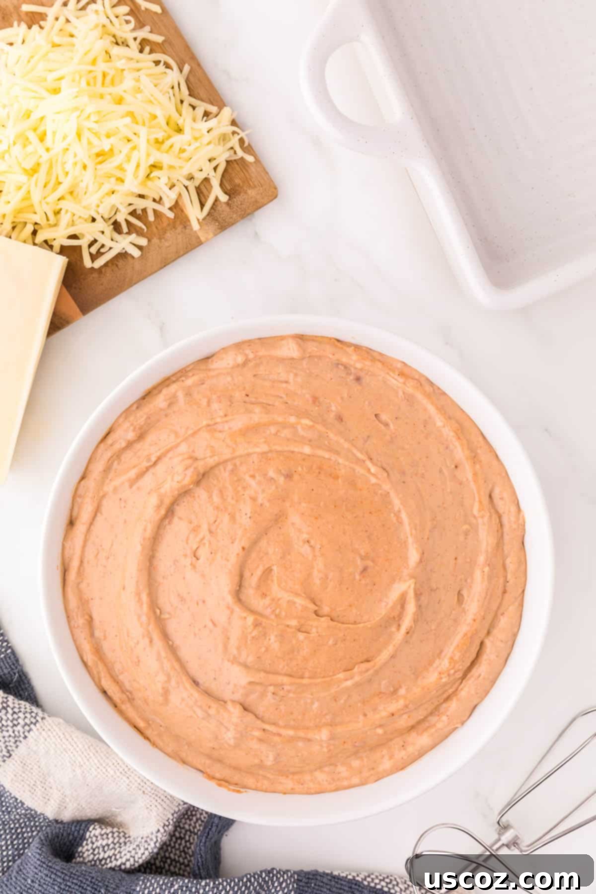 Rich Cream Cheese Bean Dip 4 Close-up of the mixed bean dip base in a bowl before baking, showing the smooth, creamy texture
