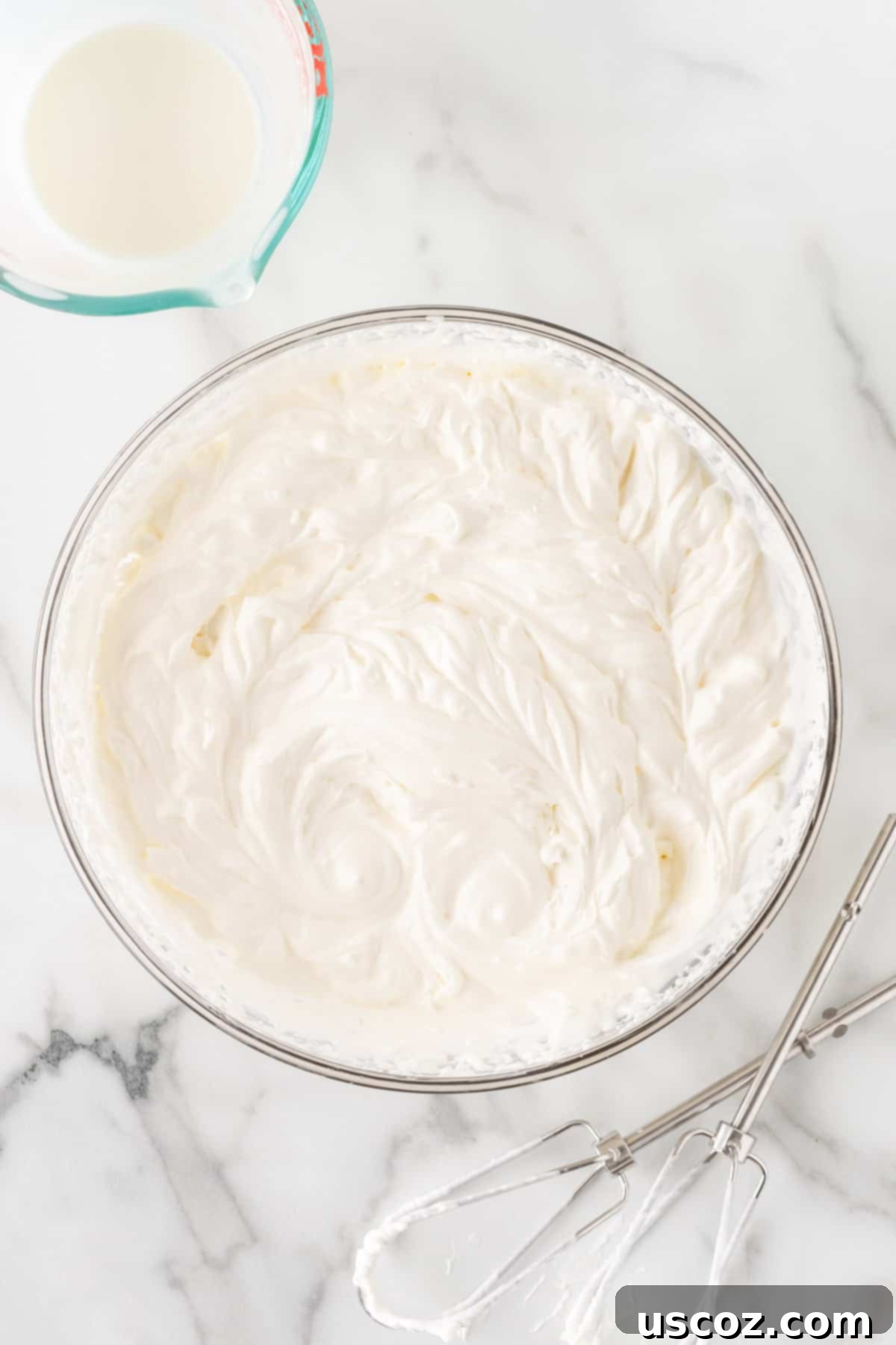 Creamy Oreo Dip 6 Fluffy homemade whipped cream in a bowl with stiff peaks