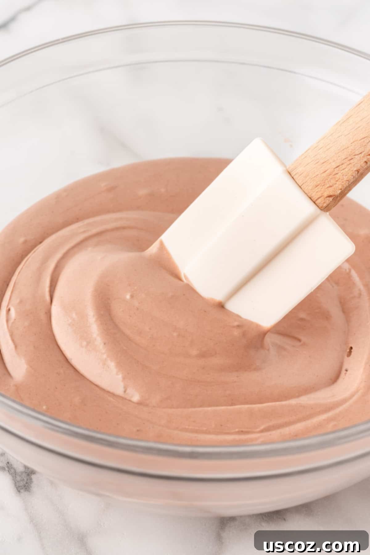 Cozy Chocolate Dip 10 The fully mixed hot chocolate dip, smooth and creamy, in a bowl.