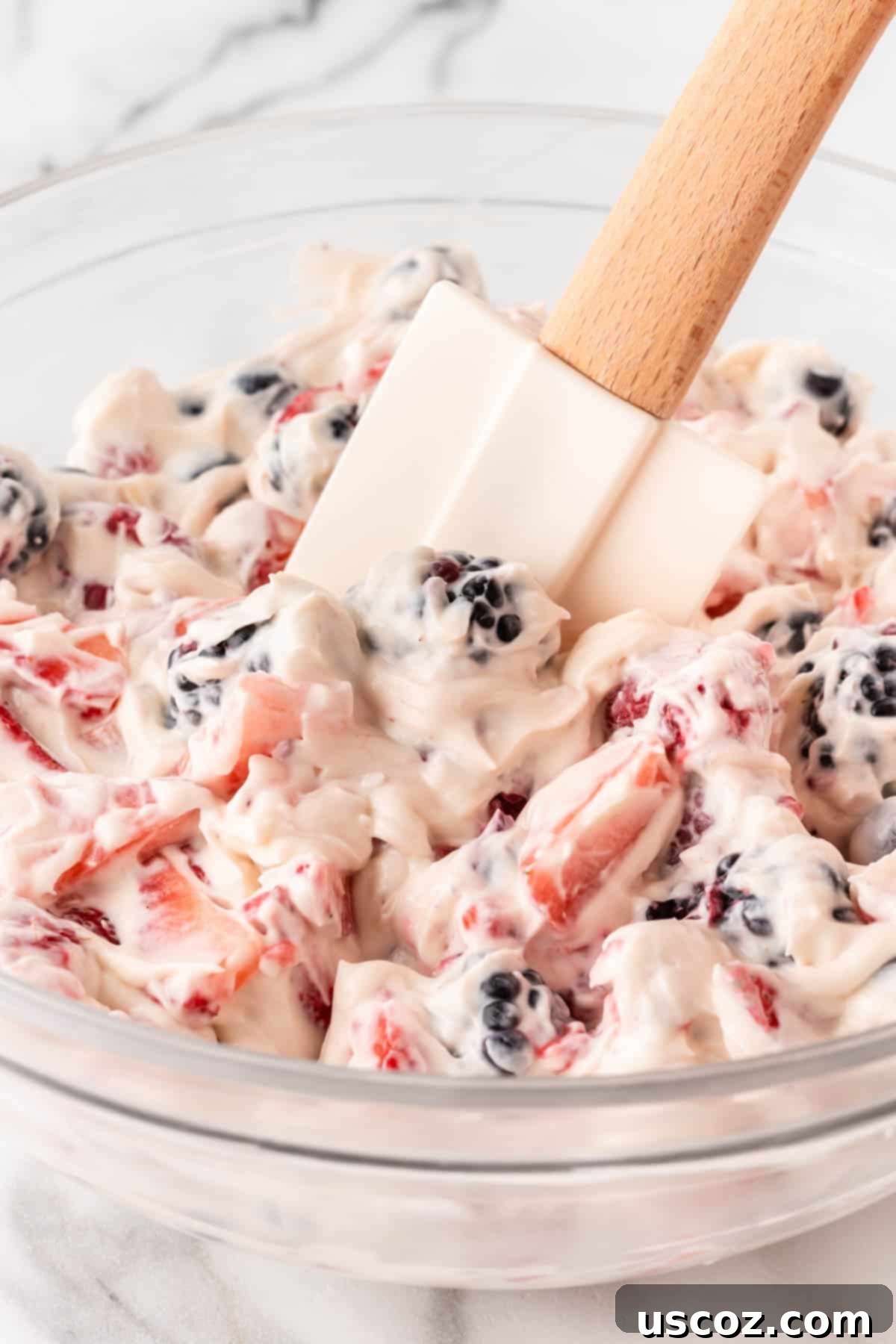 Creamy Cheesecake Fruit Delight 11 berry cheesecake salad mixed together