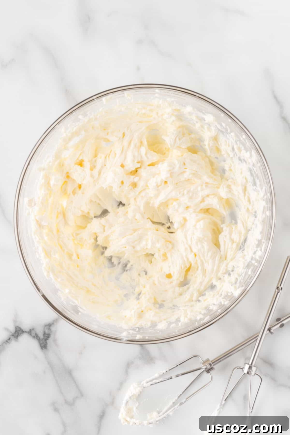 Creamy Cheesecake Fruit Delight 4 whipped cream cheese in a bowl