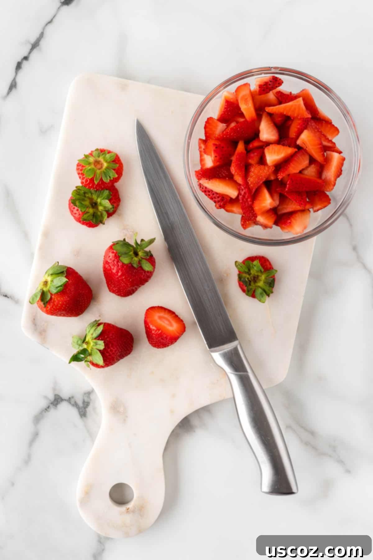Creamy Cheesecake Fruit Delight 9 cutting the strawberries