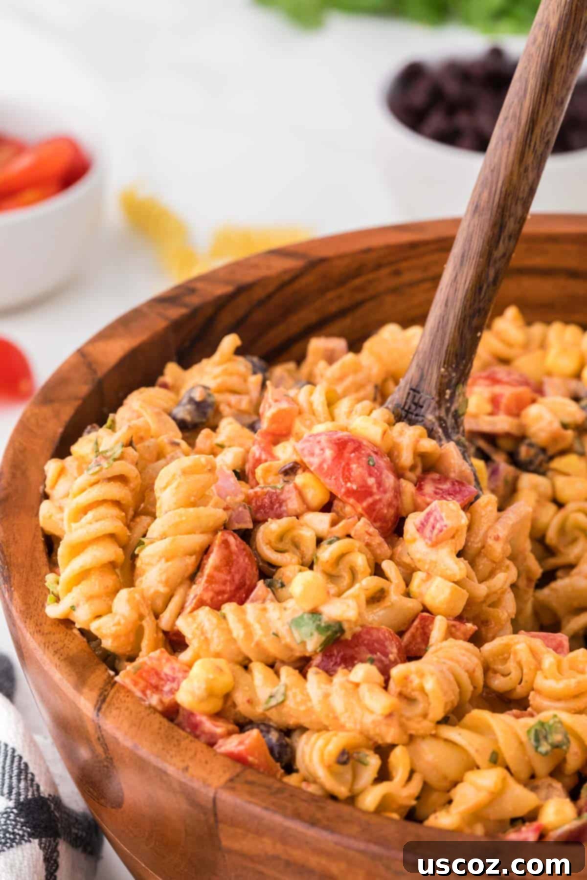 Zesty Southwest Pasta Delight 12 Another view of the Southwest Pasta Salad in a brown serving bowl, emphasizing its fresh ingredients and inviting texture.