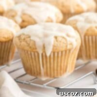 Holiday Eggnog Muffins 13 glazed eggnog muffins on a wire cooling rack